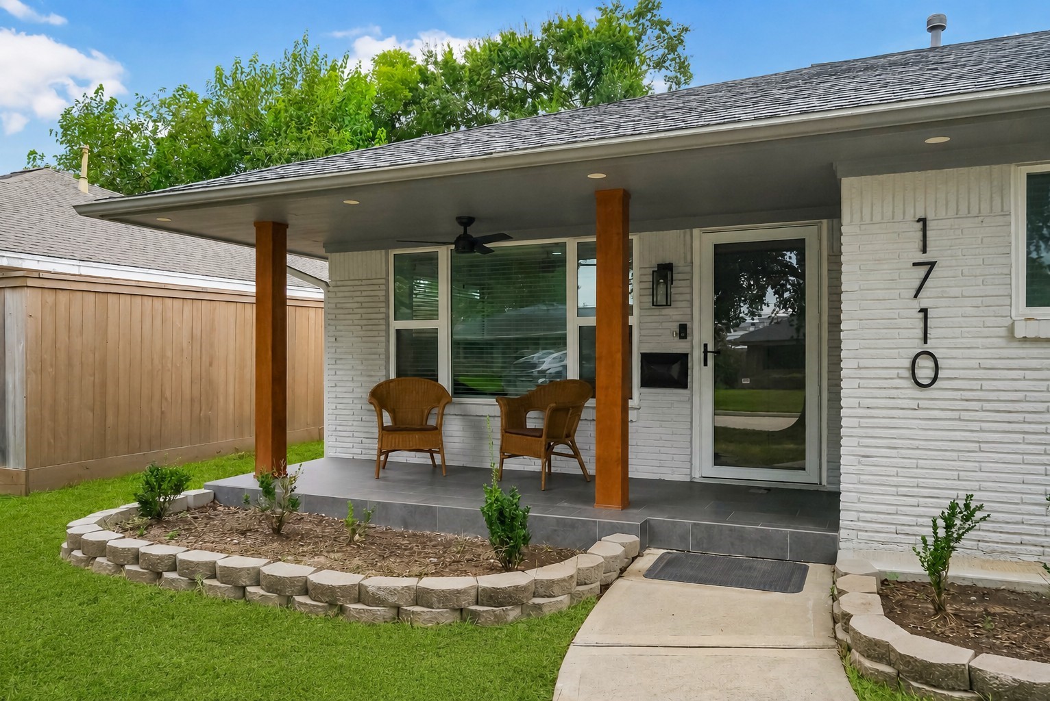 Covered front porch makes a great space for cooler evenings. Note the updated double pane energy efficient windows. Covered front porch makes a great space for cooler evenings. Note the updated double pane energy efficient windows.