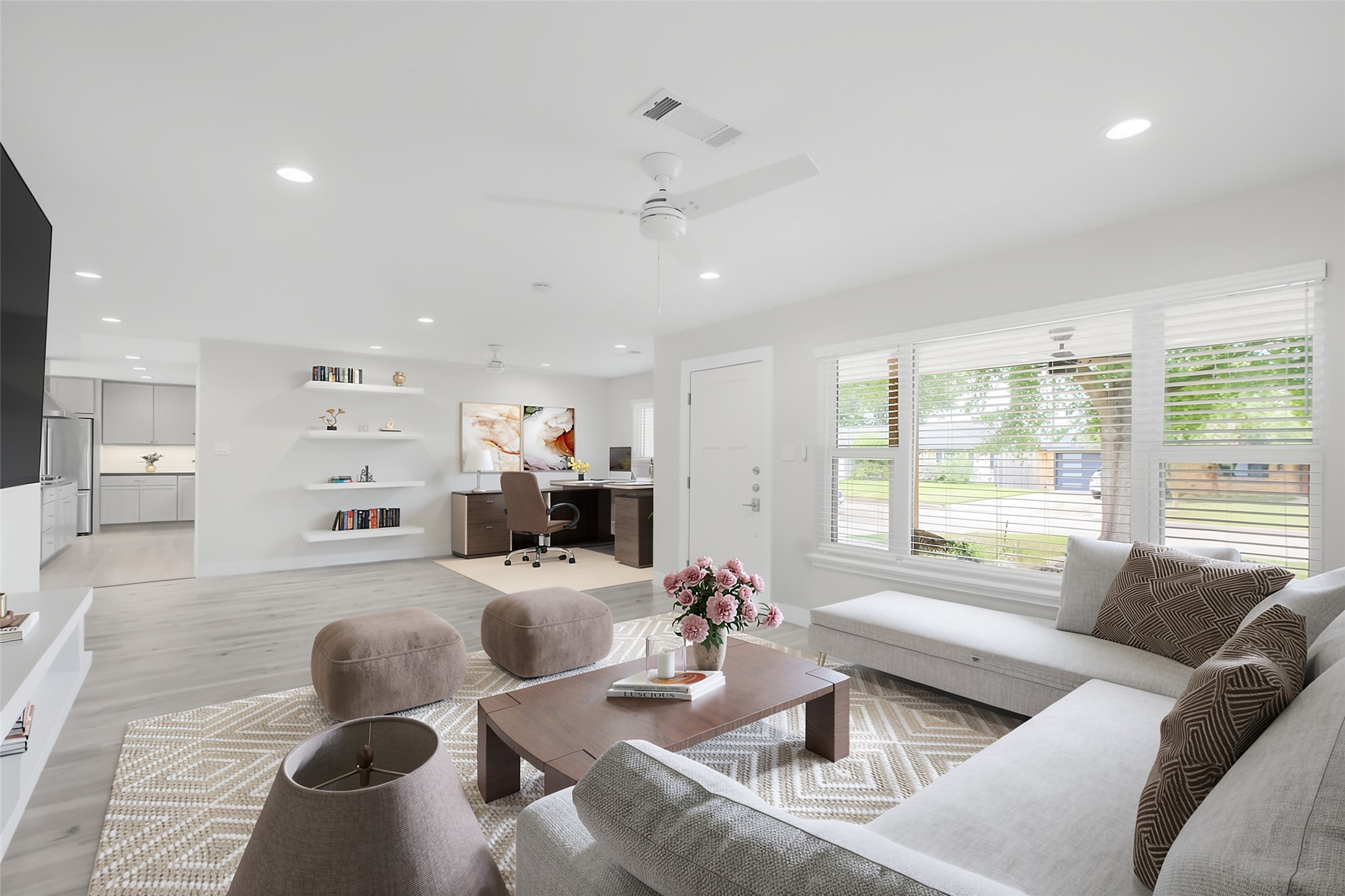 *Virtually Staged - Open concept living space as you enter the front door. Floating shelves and flex space currently used as home office. *Virtually Staged - Open concept living space as you enter the front door. Floating shelves and flex space currently used as home office.