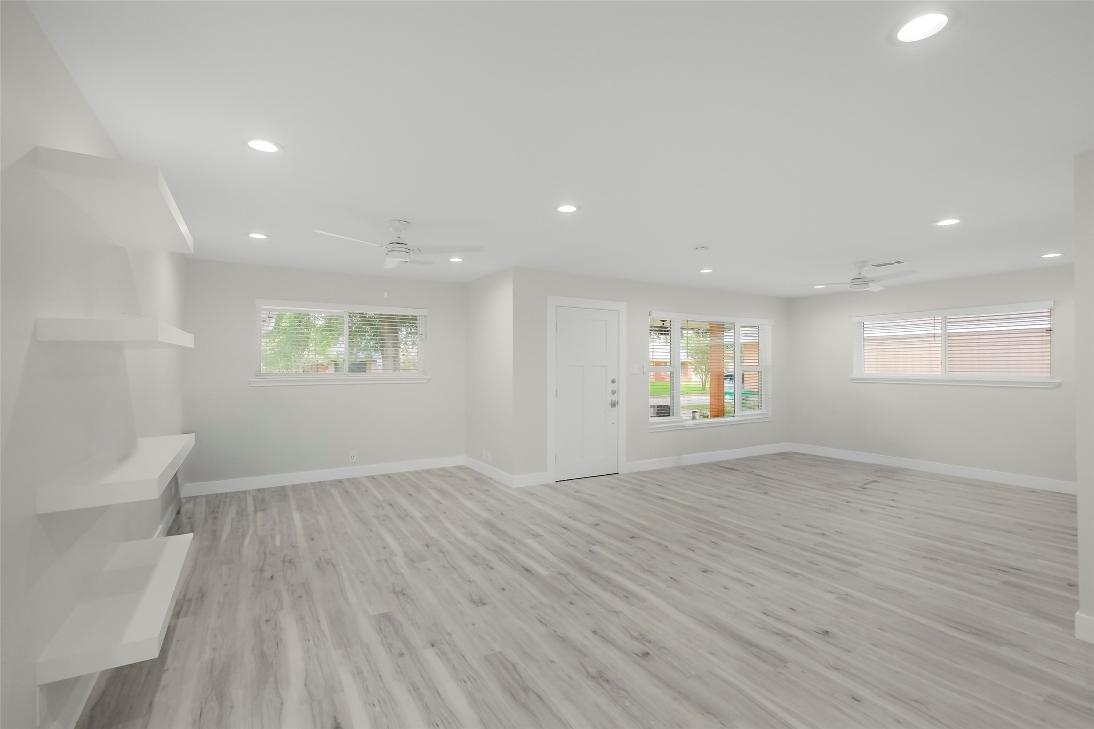 Standing in the dining room looking back to the flex space and living room. Windows provide ample natural light throughout. Standing in the dining room looking back to the flex space and living room. Windows provide ample natural light throughout.