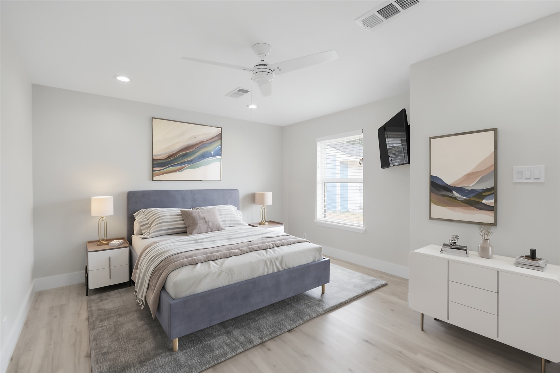 *Virtually Staged - Primary bedroom and en-suite full bath overlooks the backyard/patio.