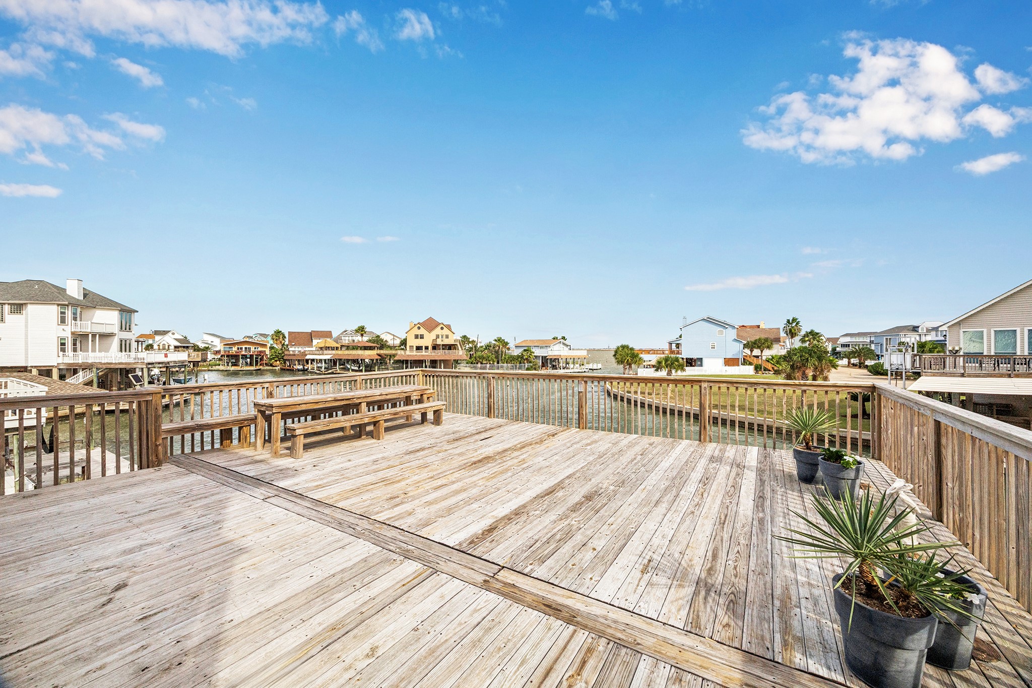 Enjoy serene waterfront views from your expansive back deck, perfect for entertaining or relaxing in style.