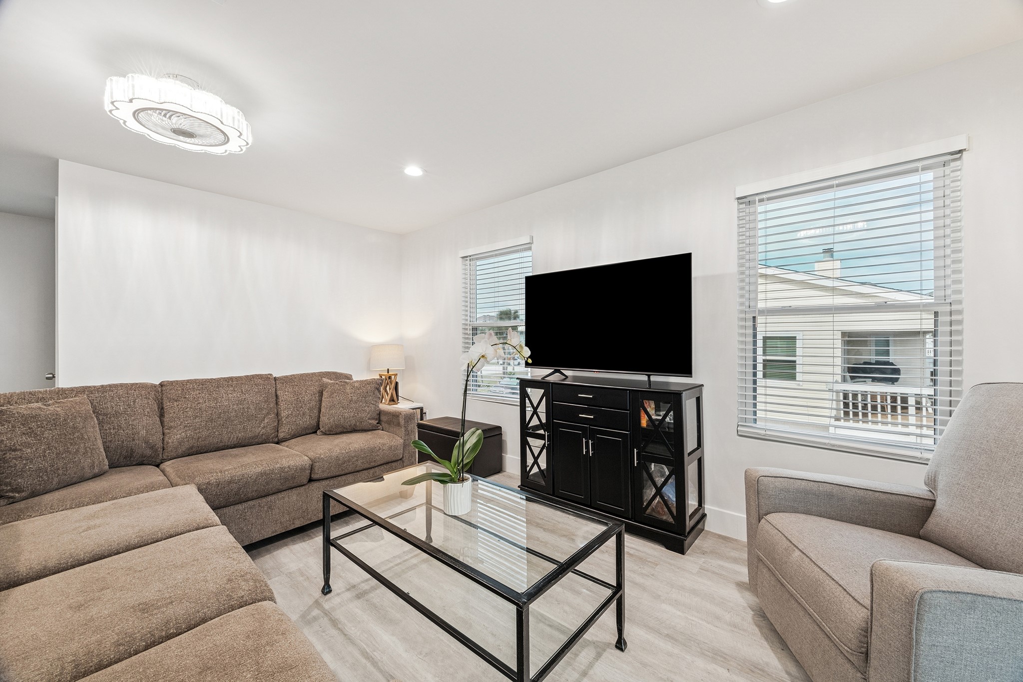 Experience the inviting warmth of this light-filled living space, perfect for bright and modern living.