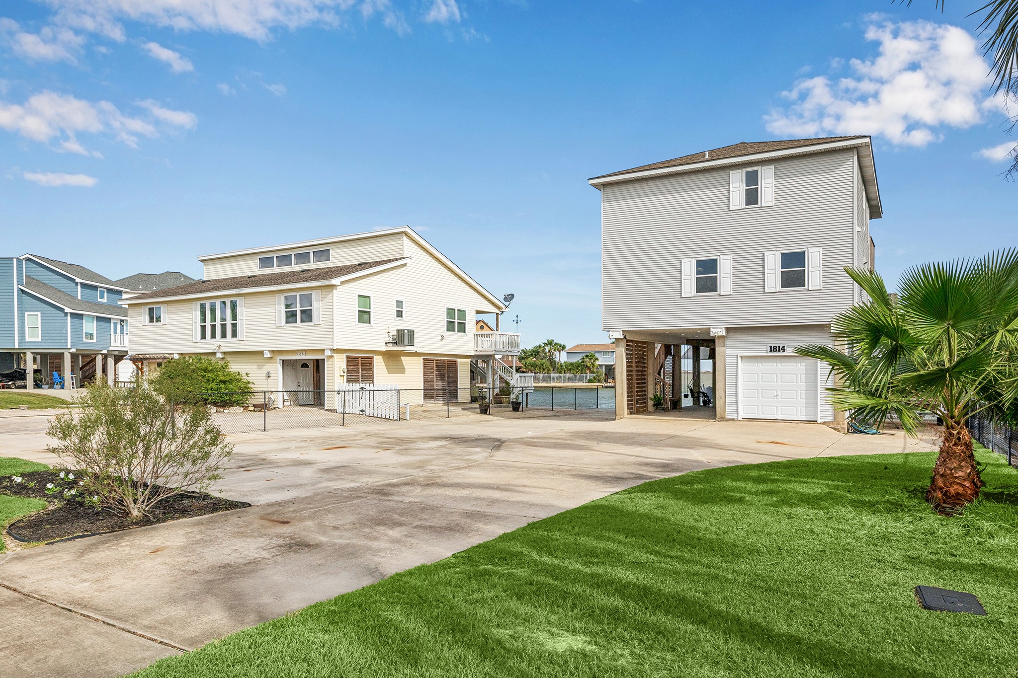 This inviting property boasts ample parking and versatile outdoor space perfect for leisure activities offering both convenience and entertainment potential.