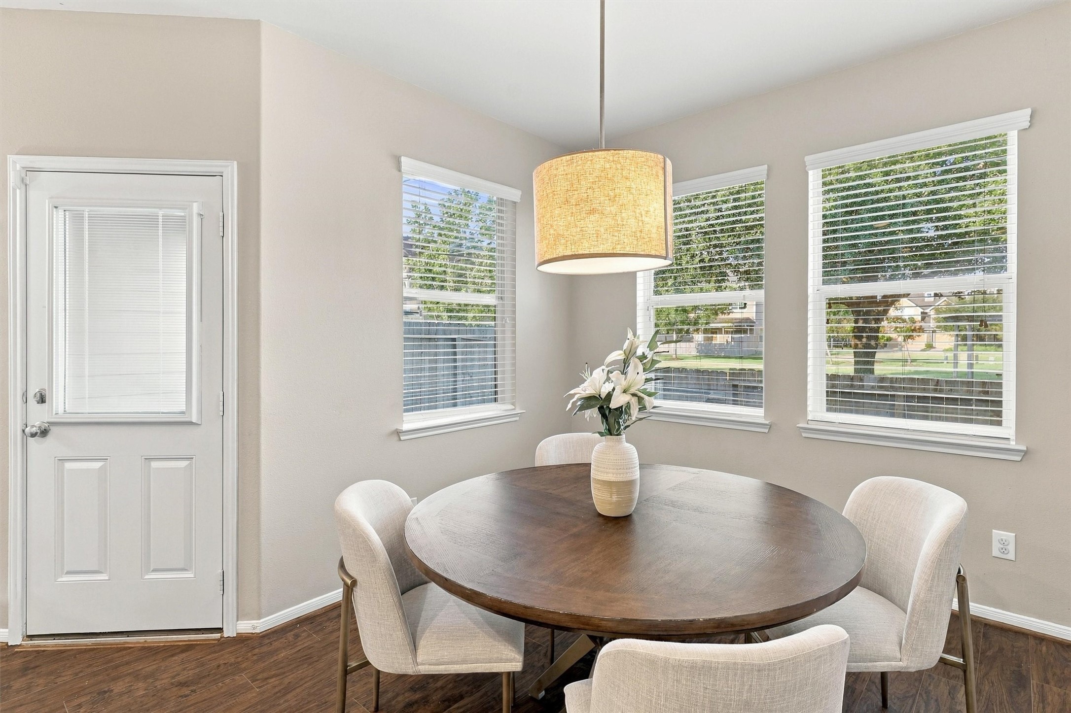 Imagine starting and ending each day in your dining room.  Surrounded by 2 walls of windows, you have views of your backyard and the park behind the home.