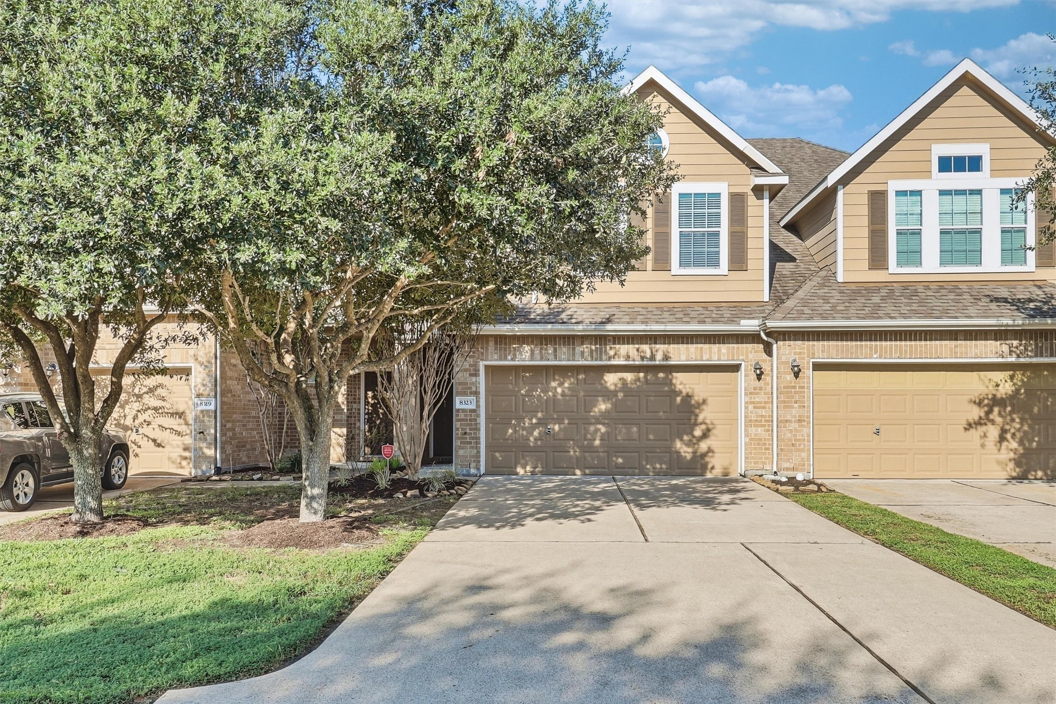 The 2-car garage and double wide driveway offer plenty of space for parking.  The double-wide driveway offers more space between you and your neighbors as well!