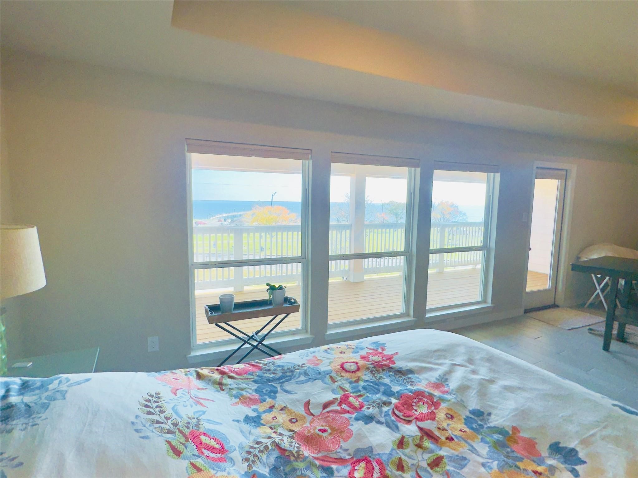 Wake up to sunrise on the bay (primary bedroom)