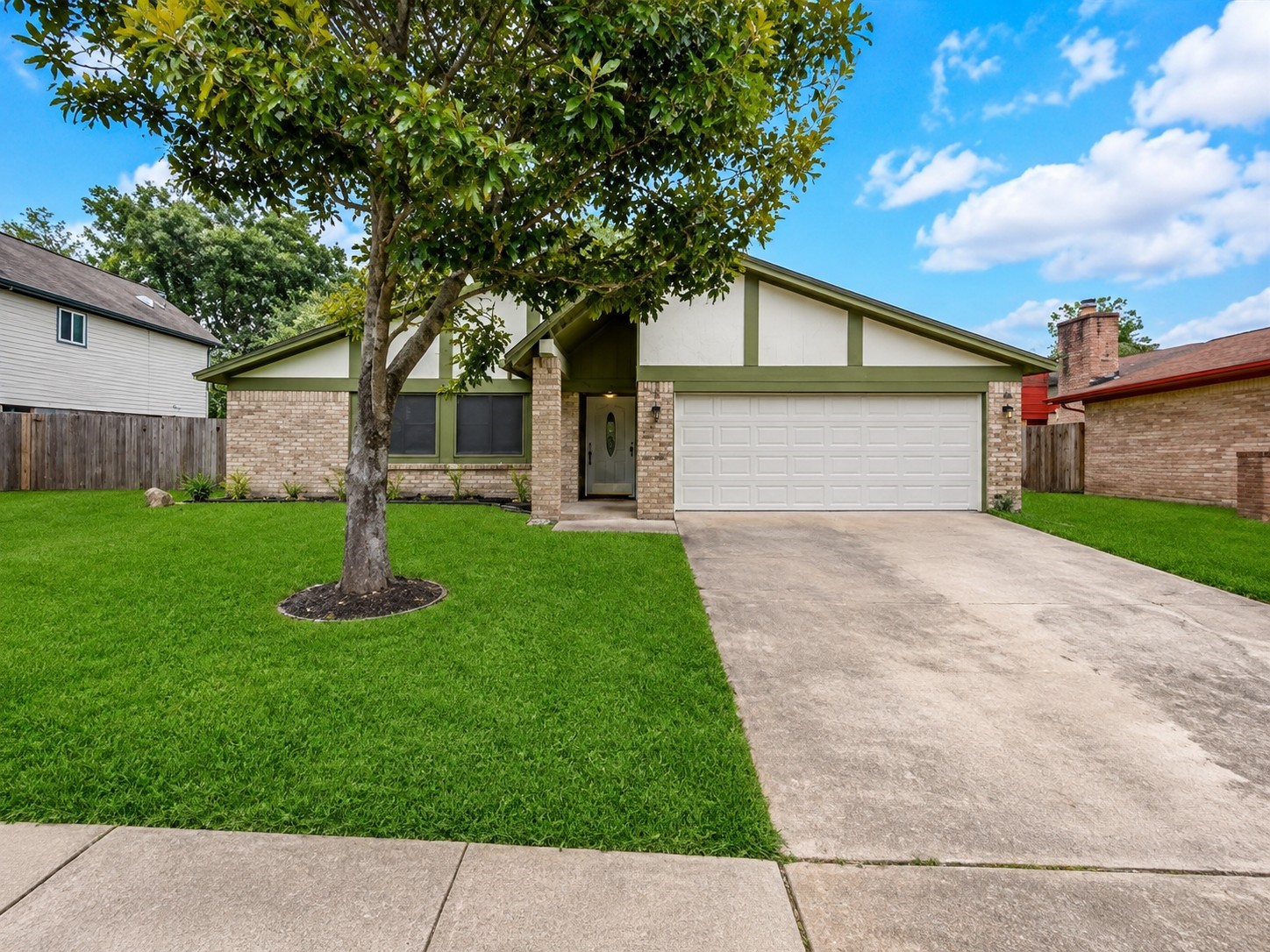 Welcome to 1707 Stone Lake Dr! This charming home features a well-maintained front lawn, mature tree, and attached two-car garage.