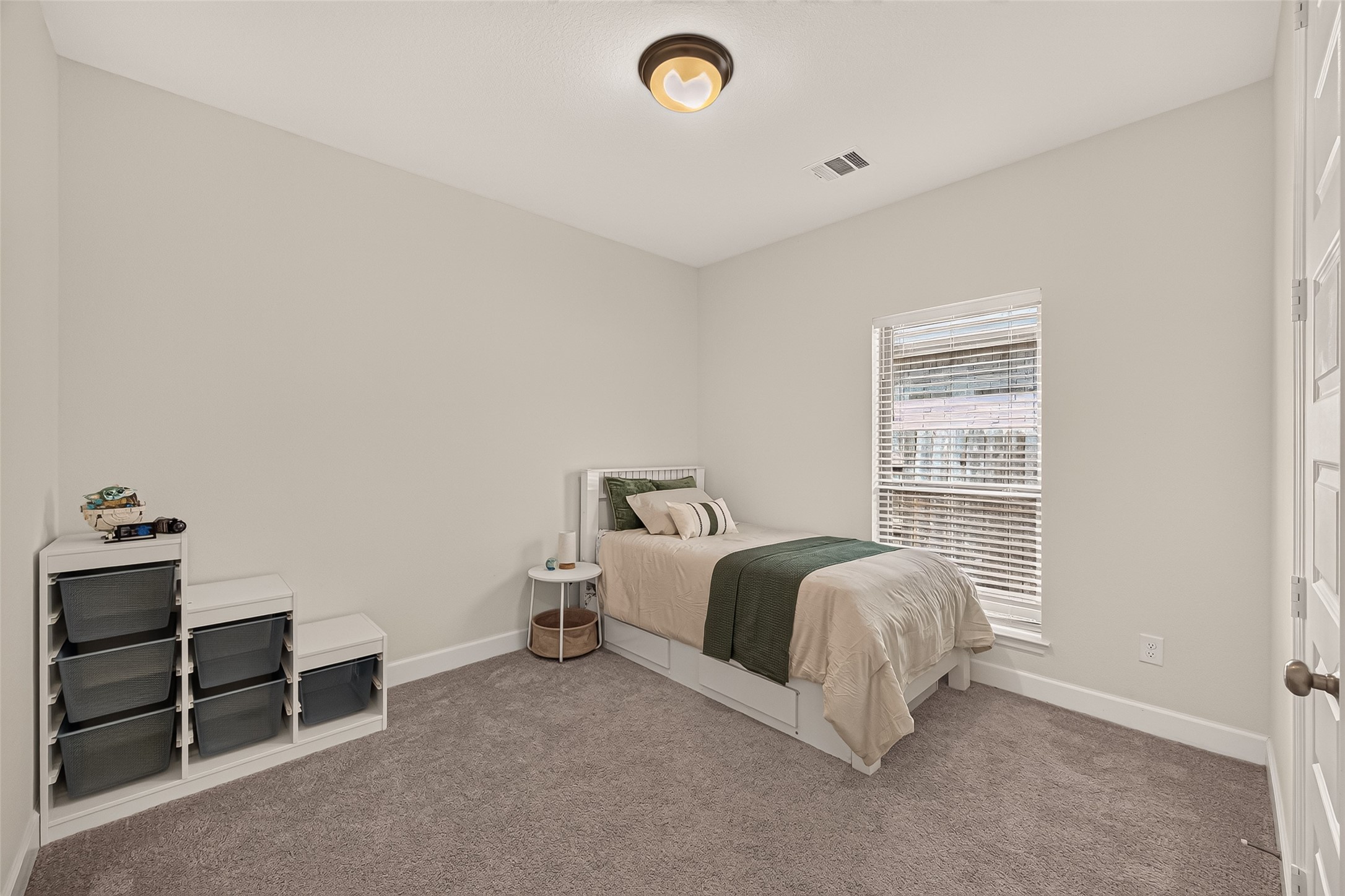 With its thoughtful layout and stylish design, this secondary bedroom offers the perfect retreat for rest and relaxation.