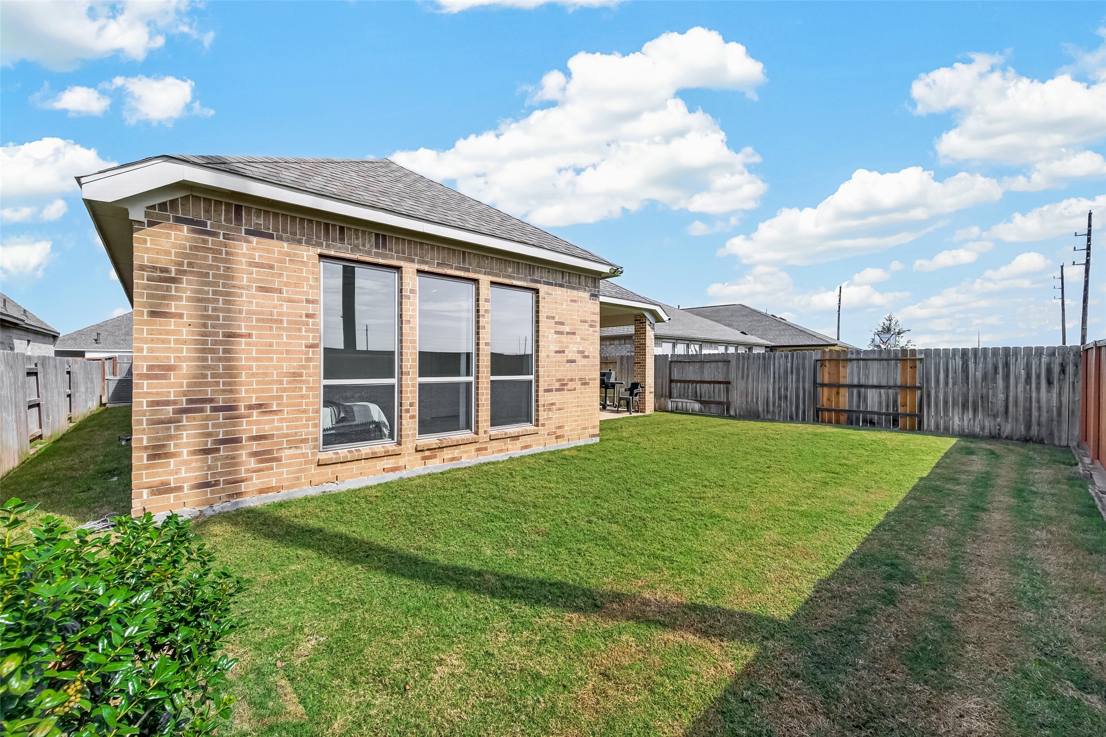 This looks like the perfect outdoor space for summer BBQs and backyard birthday parties, maybe building a pool could be in your plans for later...