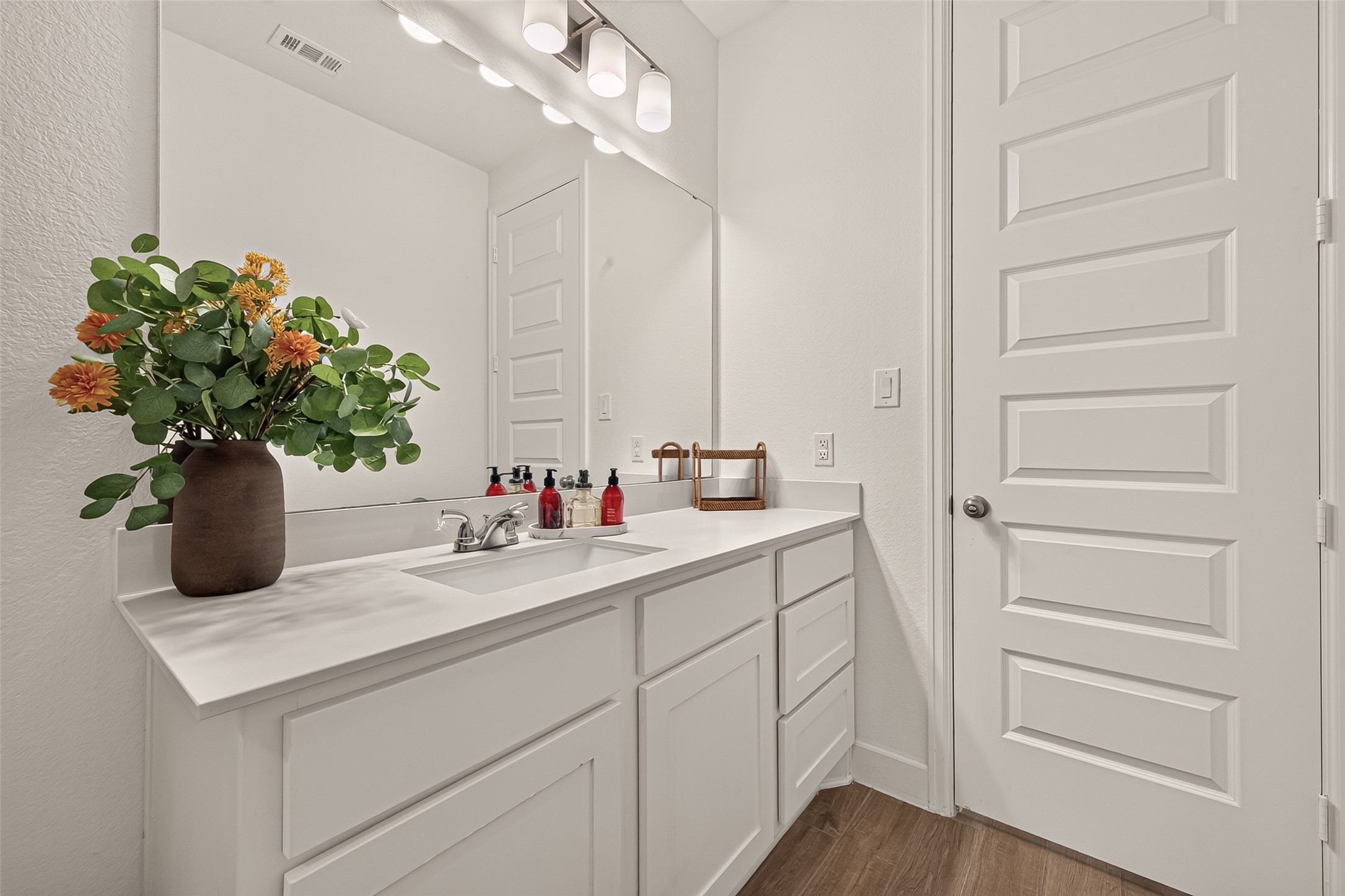 With its combination of style and functionality, this shower/tub combo is a standout feature that elevates the bathroom to new heights of practical solutions.