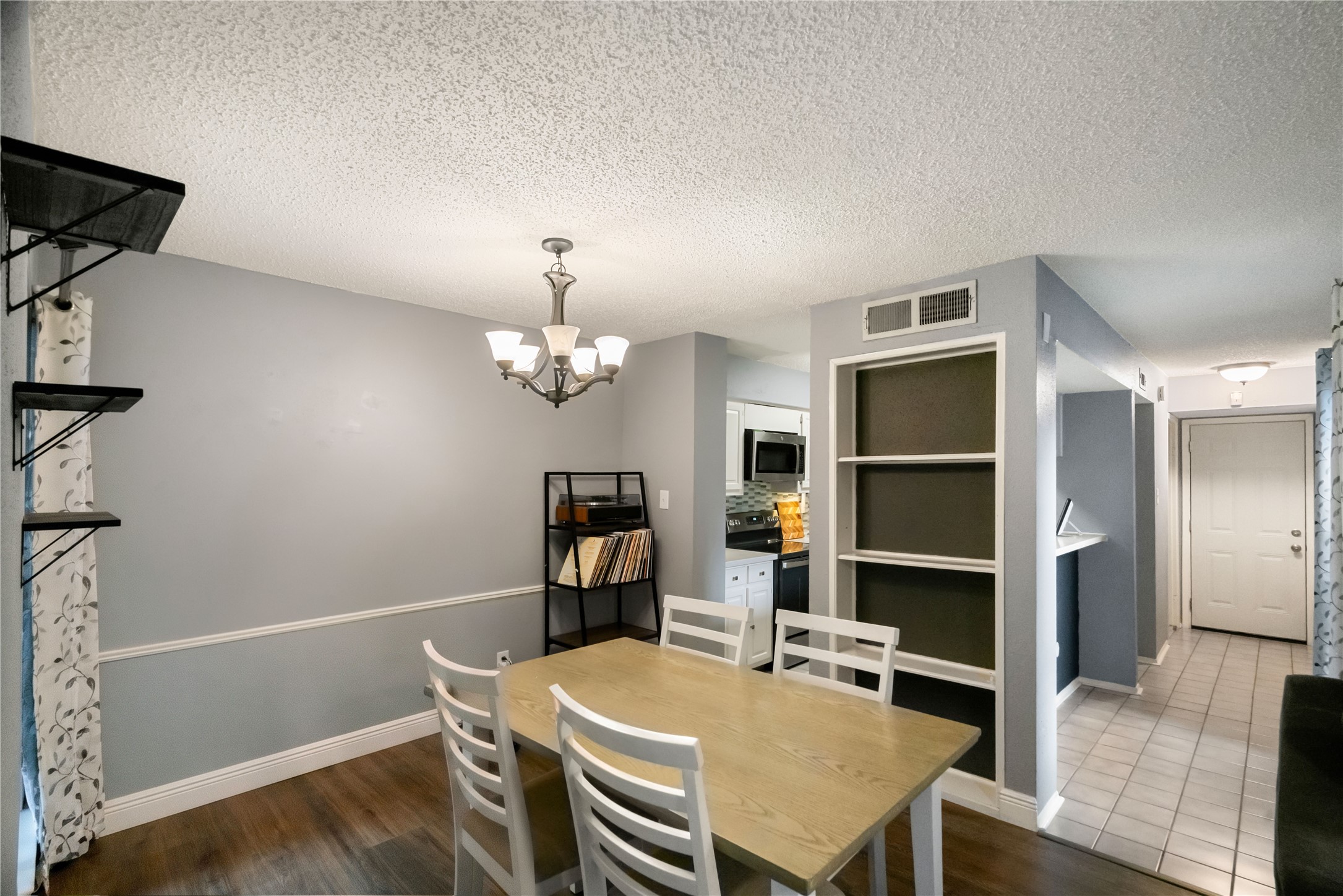 Just off the living room is the dining area Just off the living room is the dining area