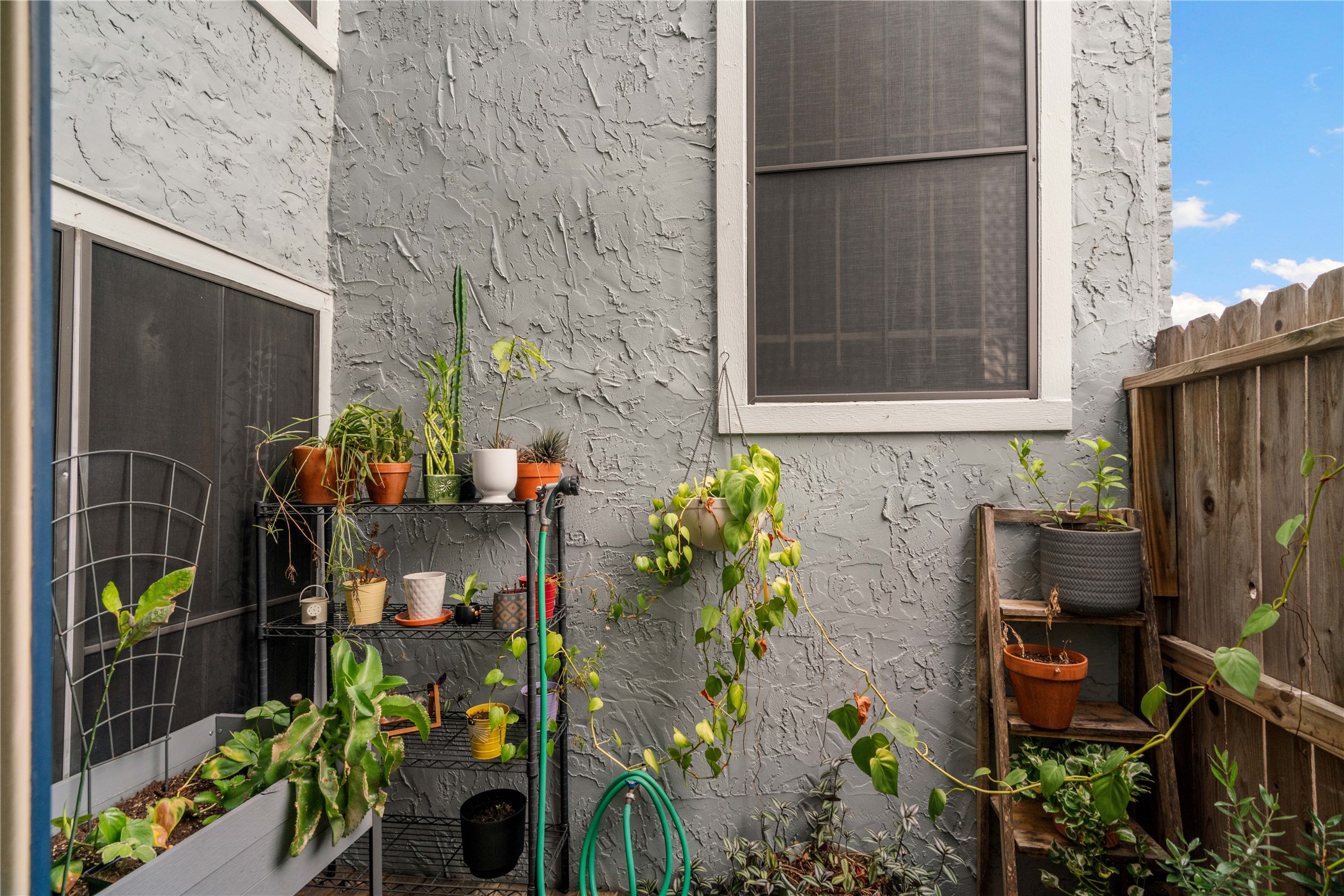 Privacy on the patio and solar screen to help with energy efficency. Privacy on the patio and solar screen to help with energy efficency.
