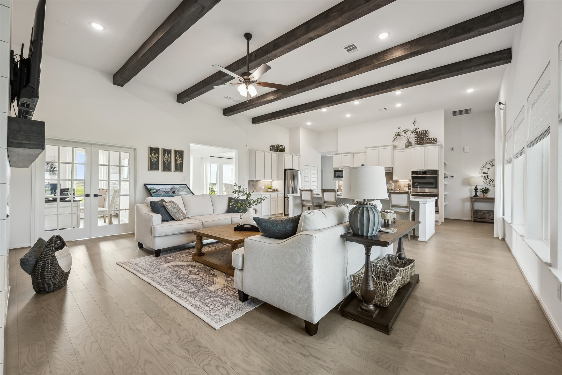 Bright open great room and kitchen Bright open great room and kitchen
