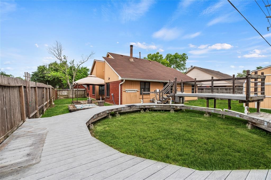 Nice deck with a shed in the back yard