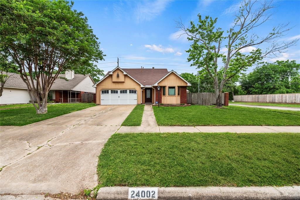 Corner lot with walking path to back yard with