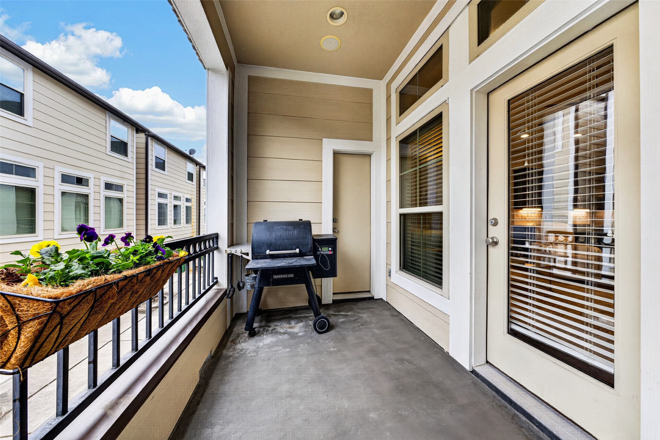 The patio is close to the kitchen, making grilling a breeze.