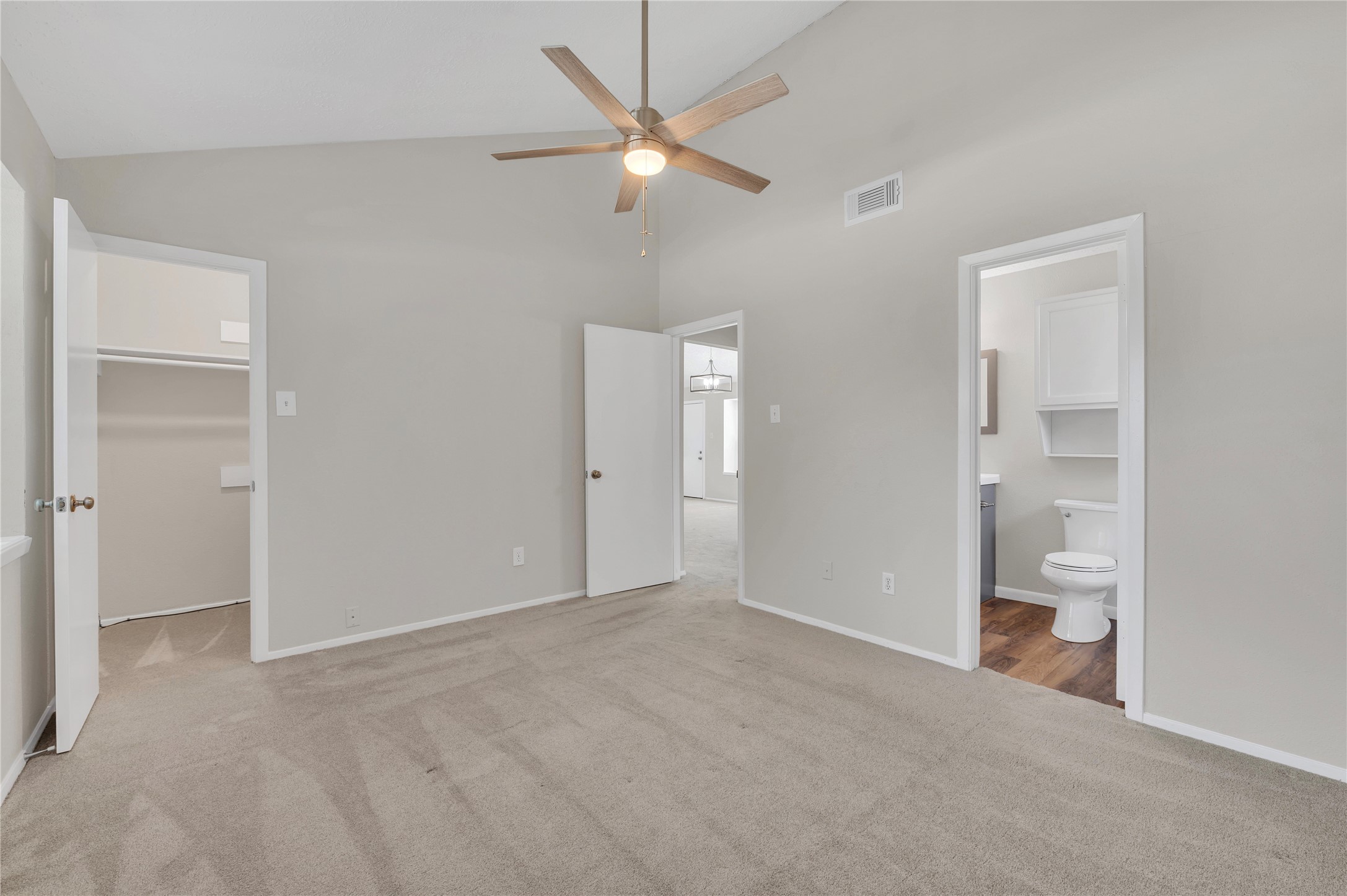 Walk in closet and access to the full bath from the primary bedroom.