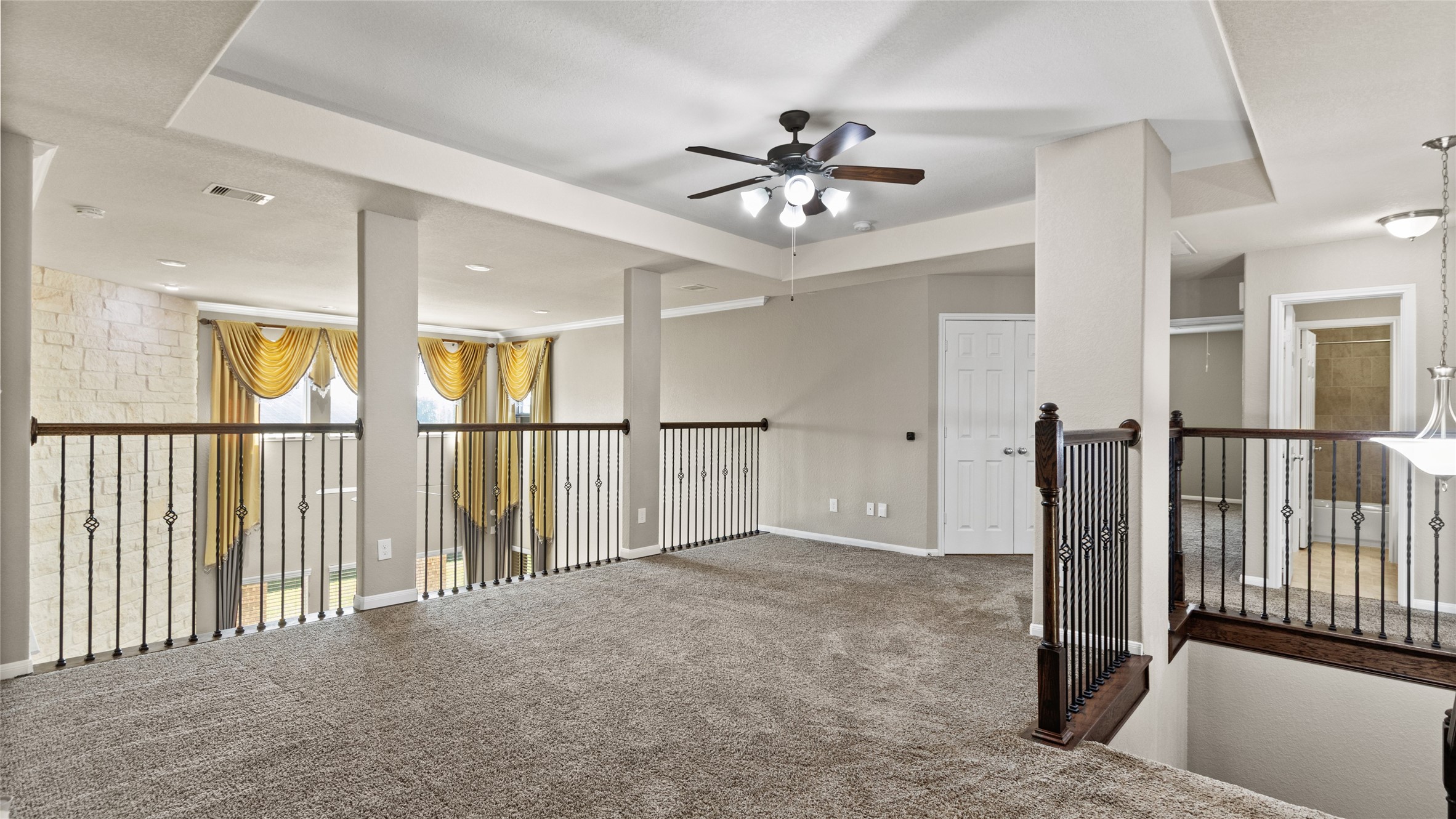 This versatile space is ideal as a secondary living area for those residing on the second level, or it could easily serve as a dedicated gameroom for the whole family.