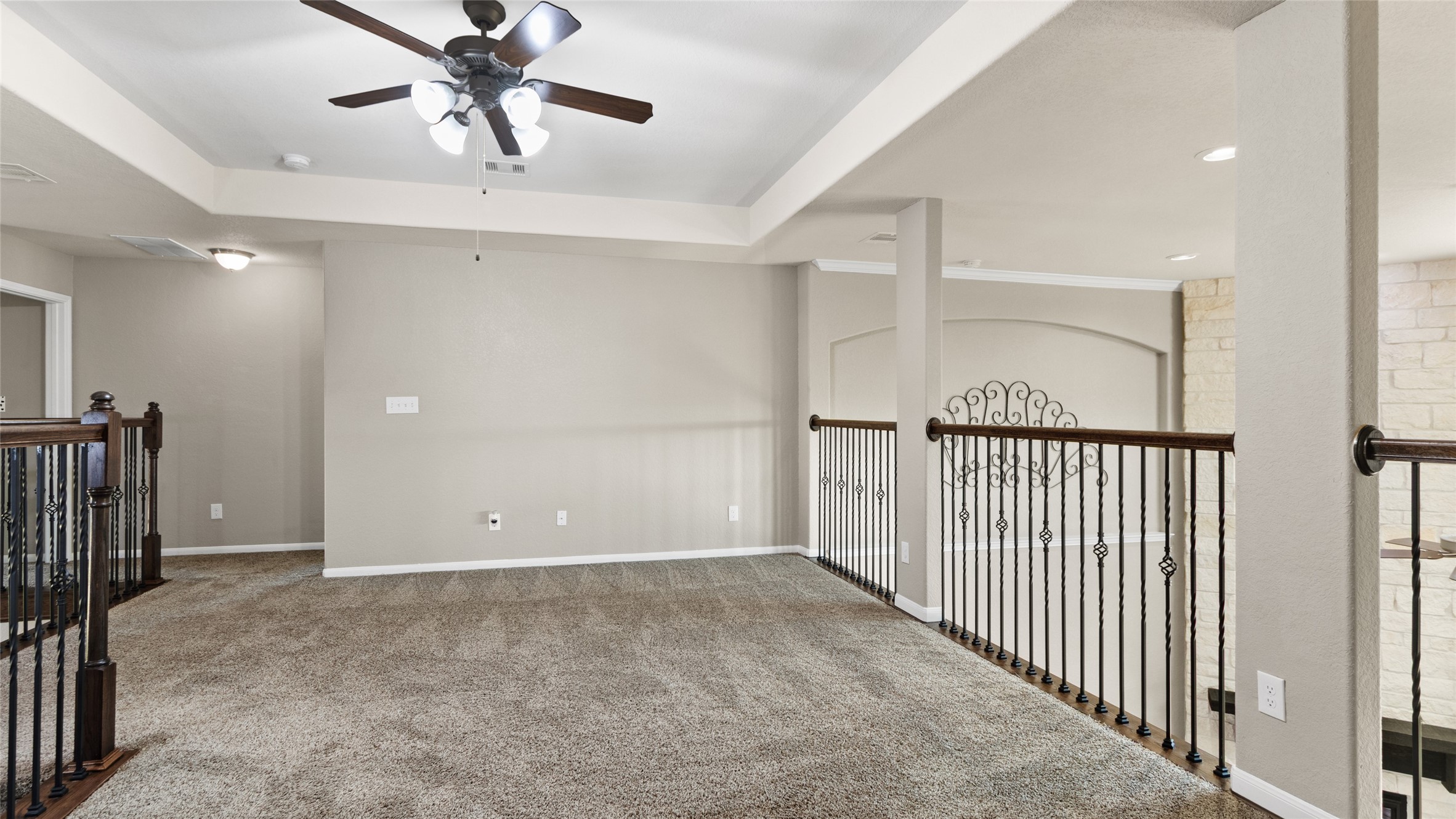 Anothe view of the large open versitile space upstairs that leads to each bedroom and media room.