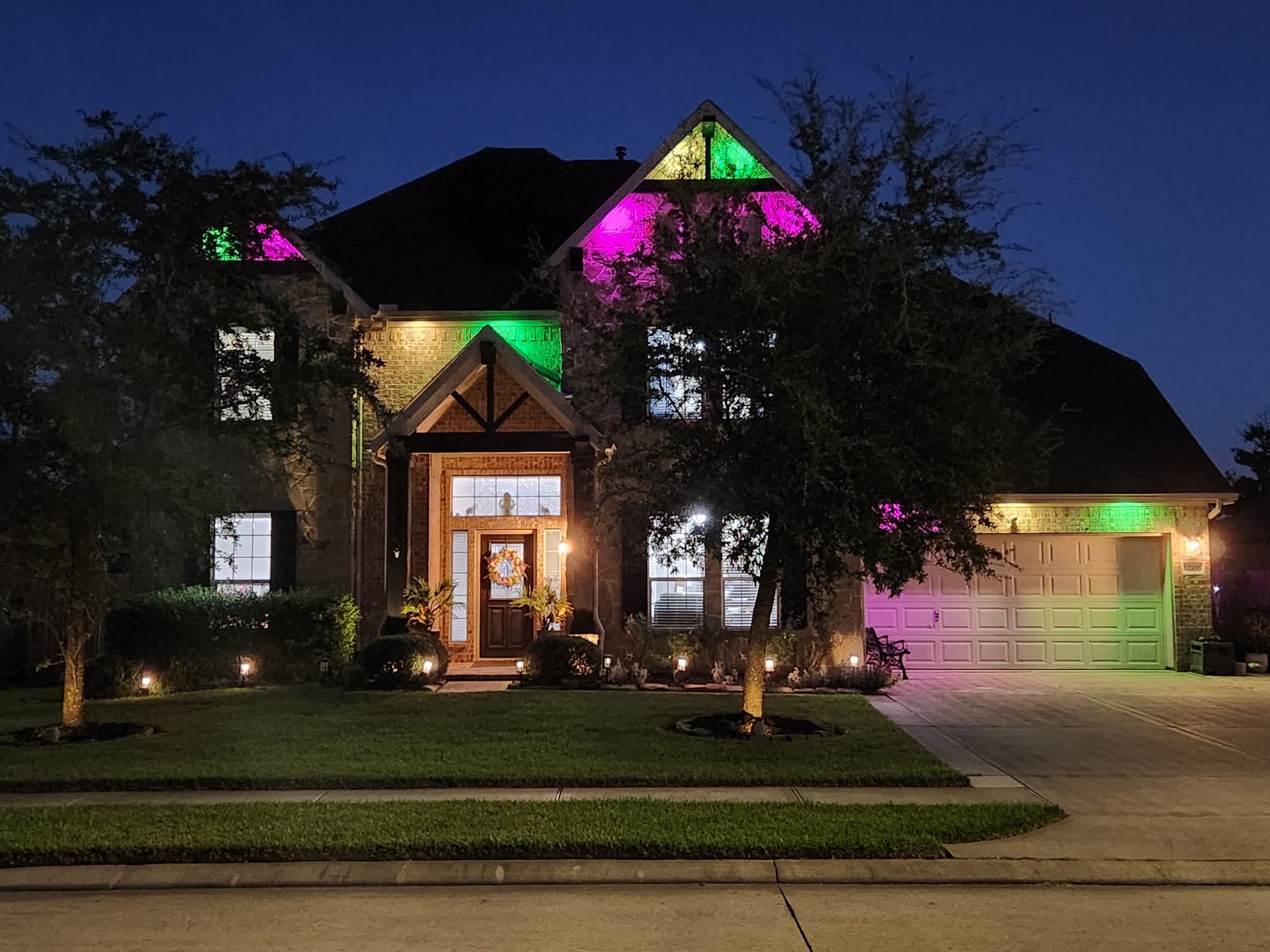 A twilight view of the home that has year round lights installed that operate from an App. The color schemes are endless! A twilight view of the home that has year round lights installed that operate from an App. The color schemes are endless!