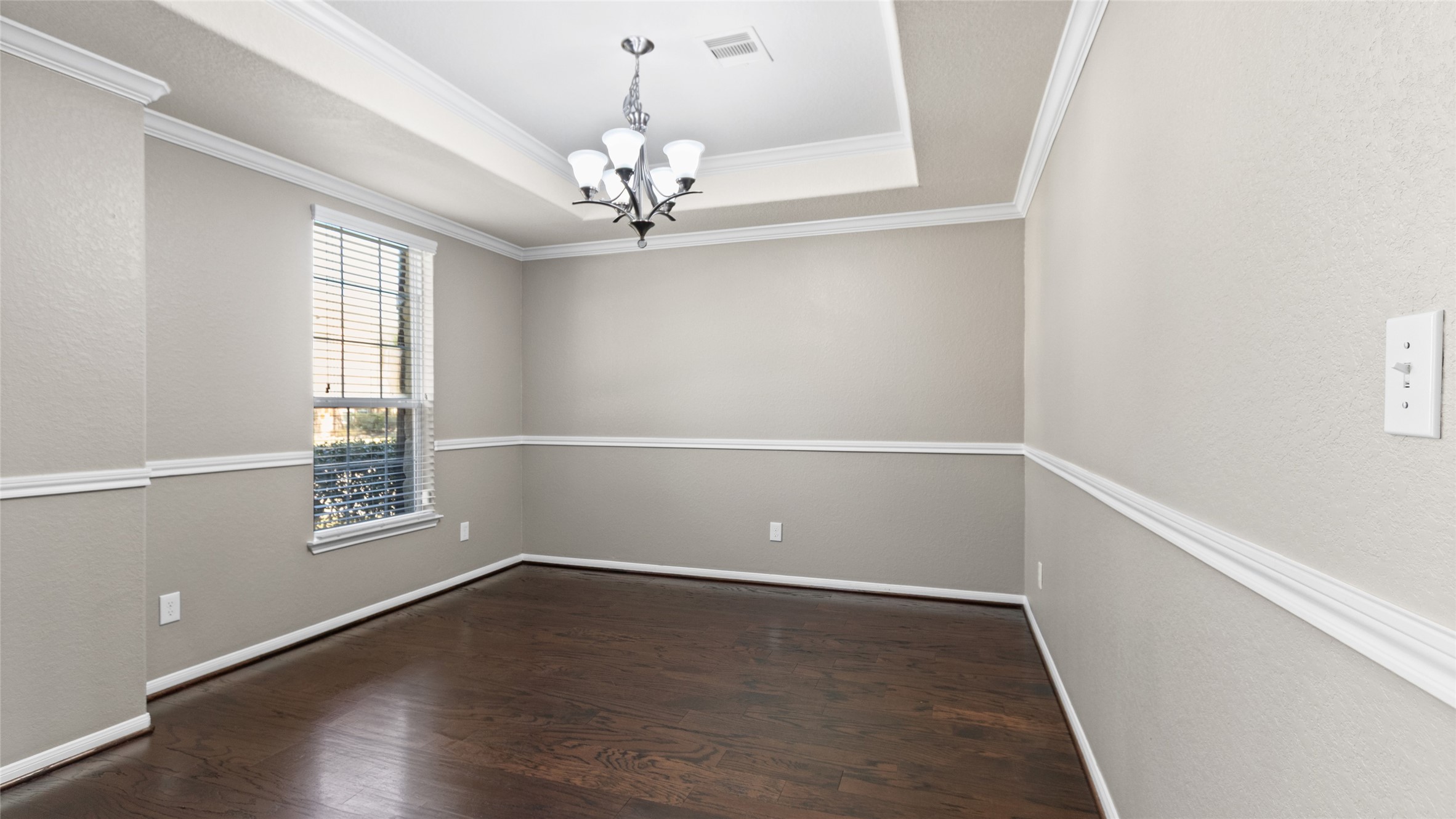 A nicely stated formal dining room that is located just to your left as you enter the home.