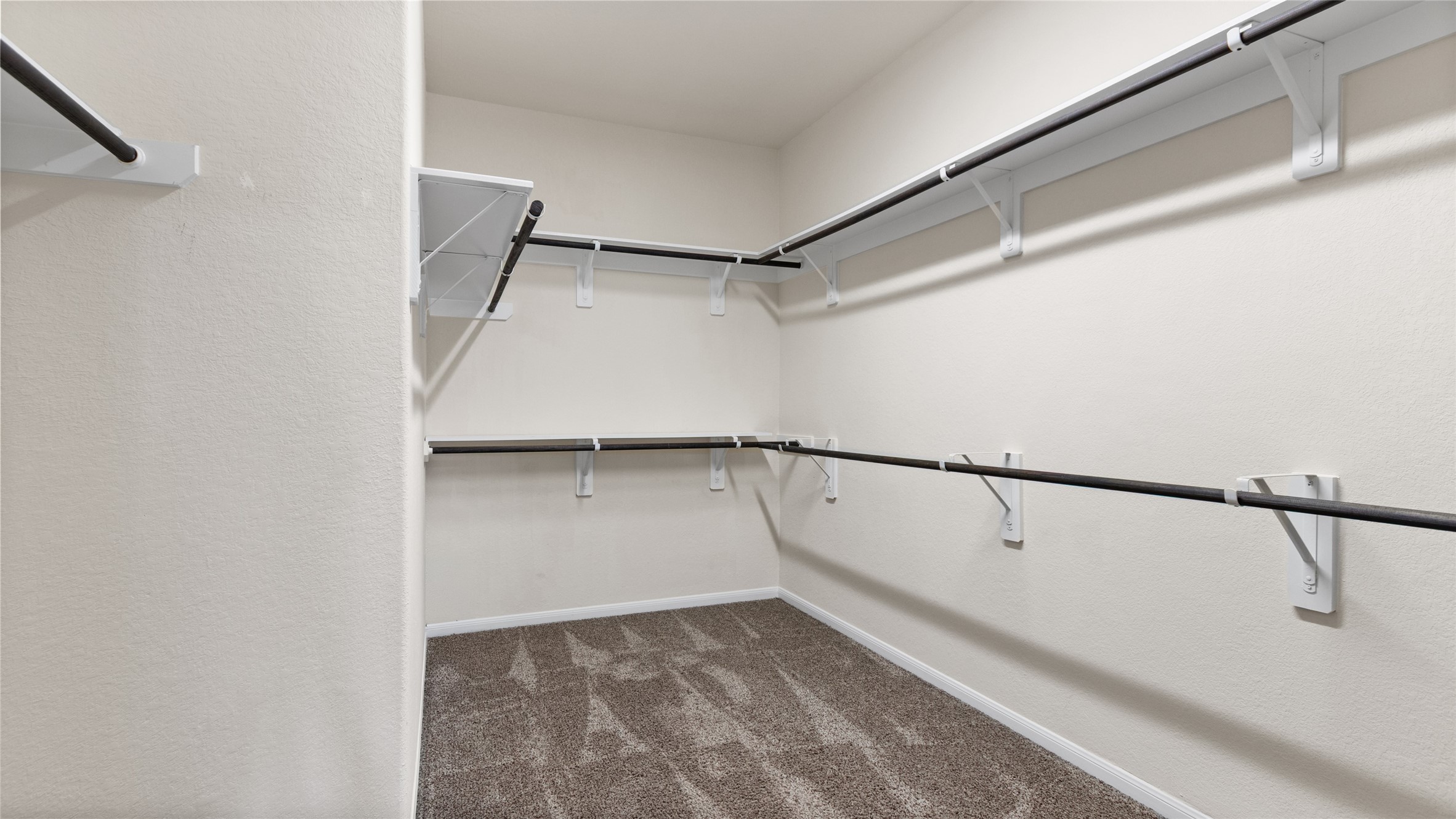 This picture doesn't show the entire primary closet but this space is quite large.