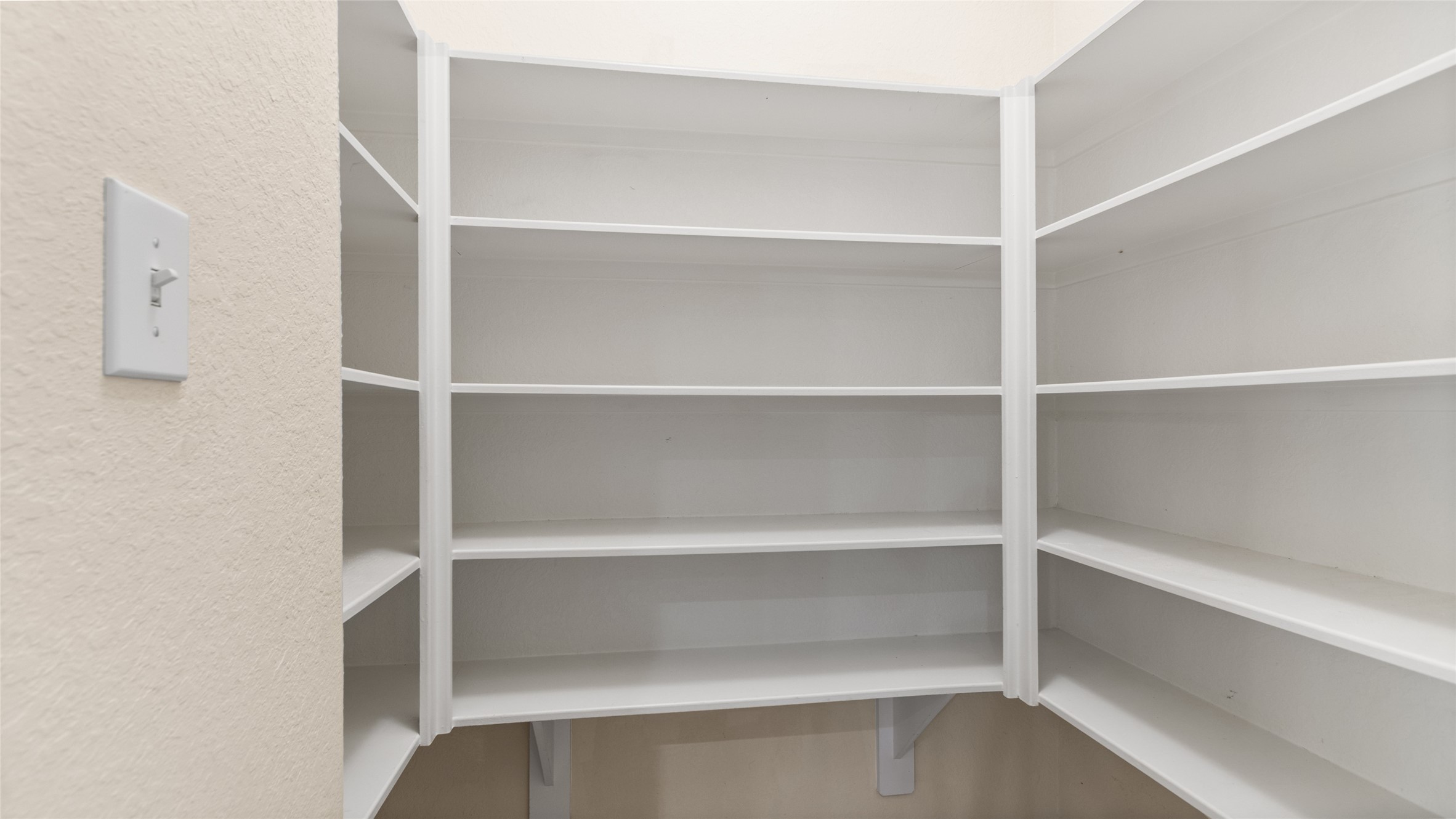 A large walk in pantry in the kitchen.