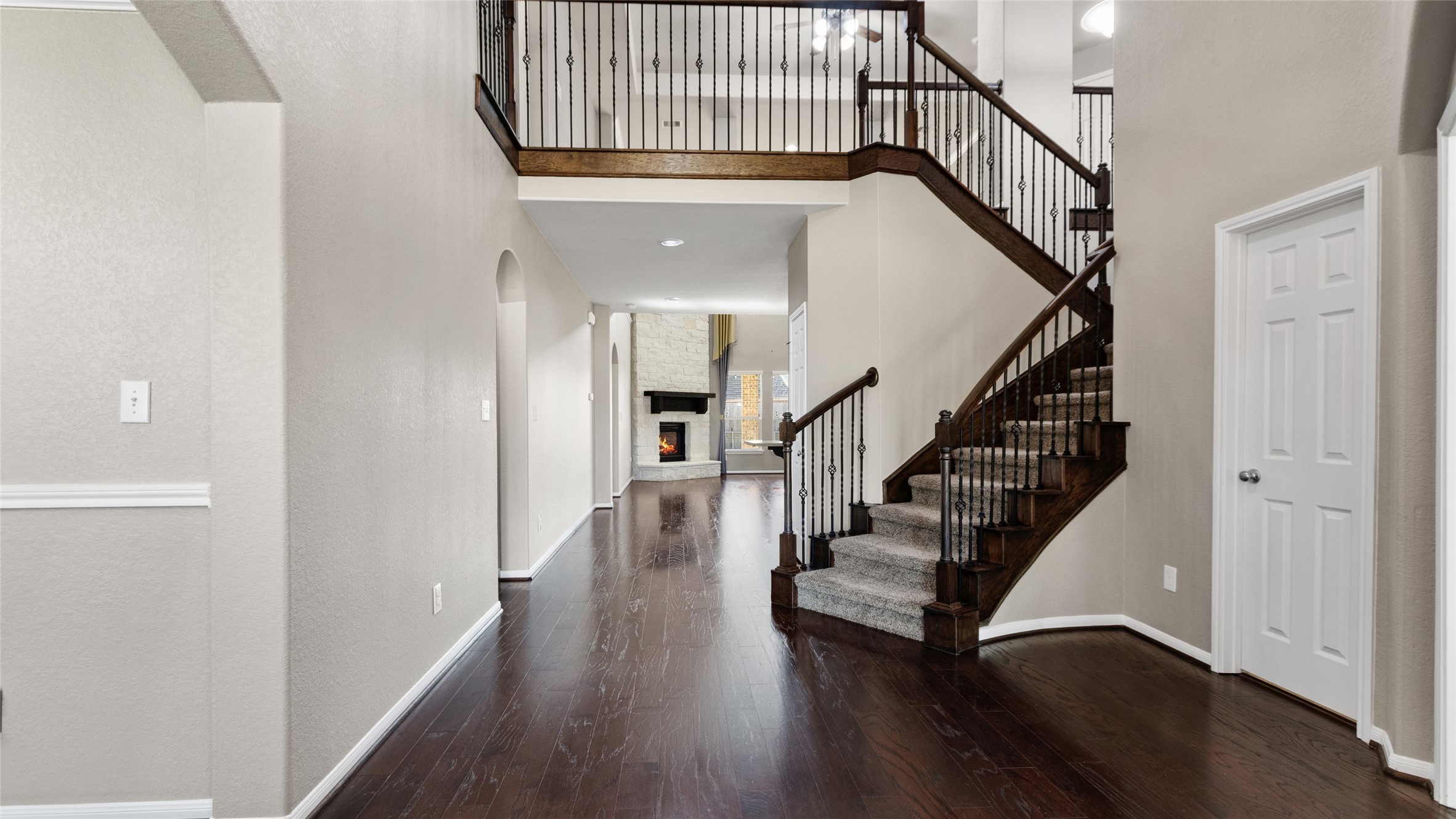 The entryway is stunning with beautiful wood flooring, high ceilings, an office to your right and a formal dining to your left and a beautiful staircase to the 2nd level. The entryway is stunning with beautiful wood flooring, high ceilings, an office to your right and a formal dining to your left and a beautiful staircase to the 2nd level.
