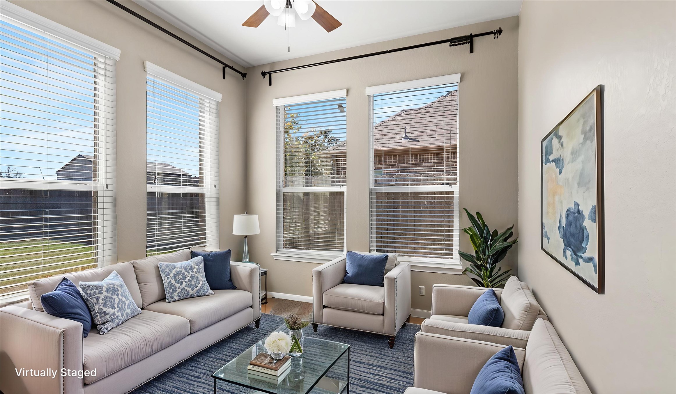 Imagine this space as your own private retreat for relaxing in the sunroom, or use it to host meetings and invite others to get cozy with you!