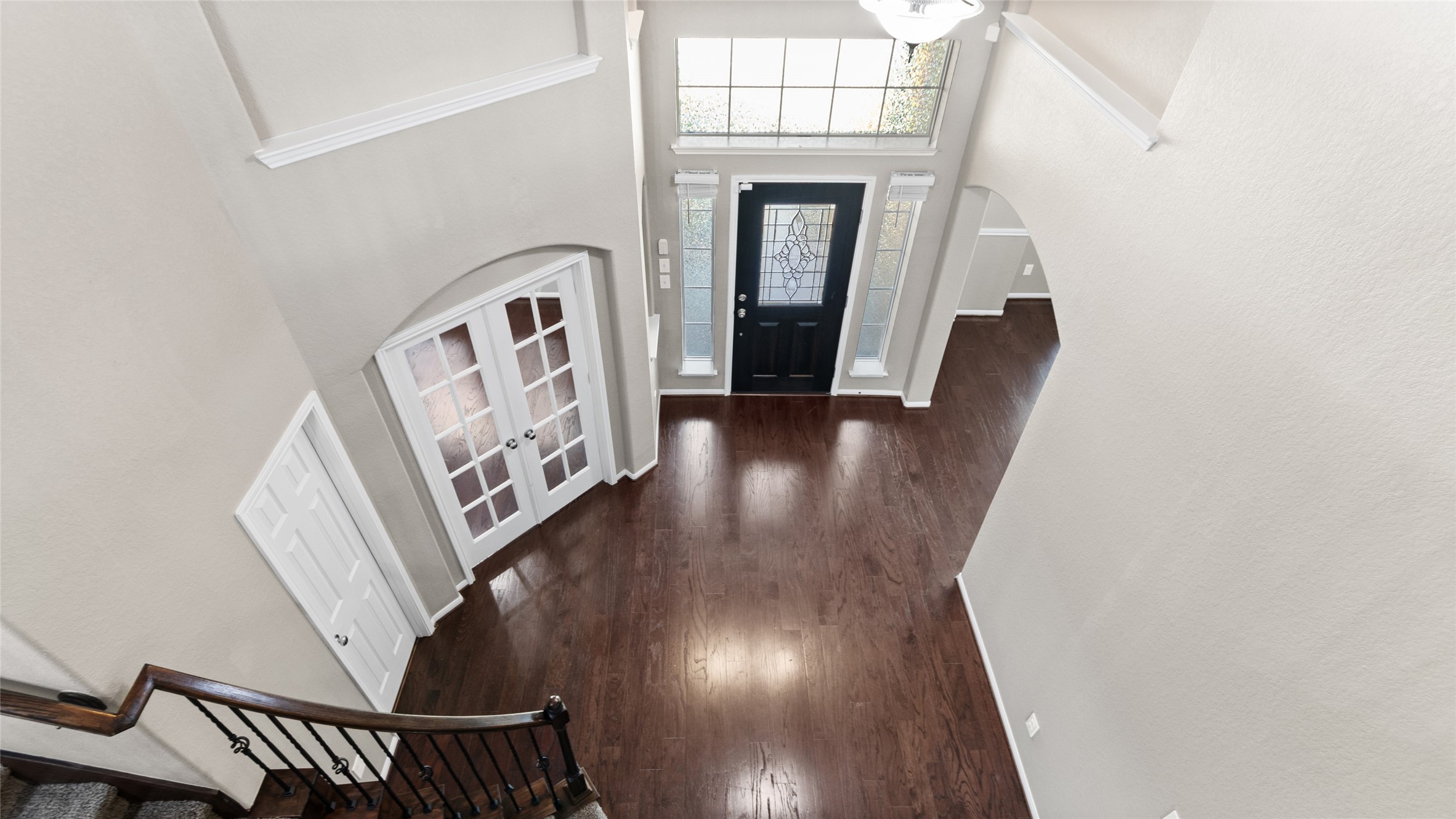 A beautiful view of the entryway from the upstairs living and gameroom.