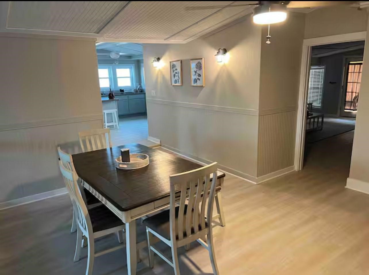 Dining area w/kitchen in the rear.