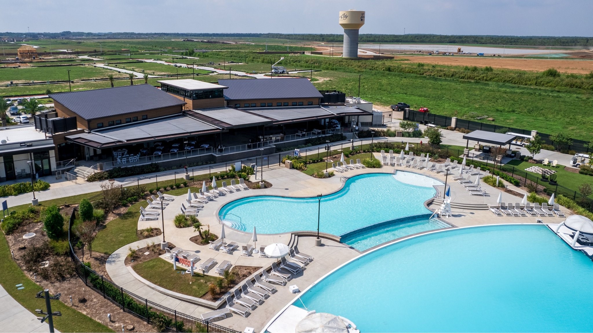 Residents enjoy access to a resort-style pool, clubhouse, and exceptional community amenities.