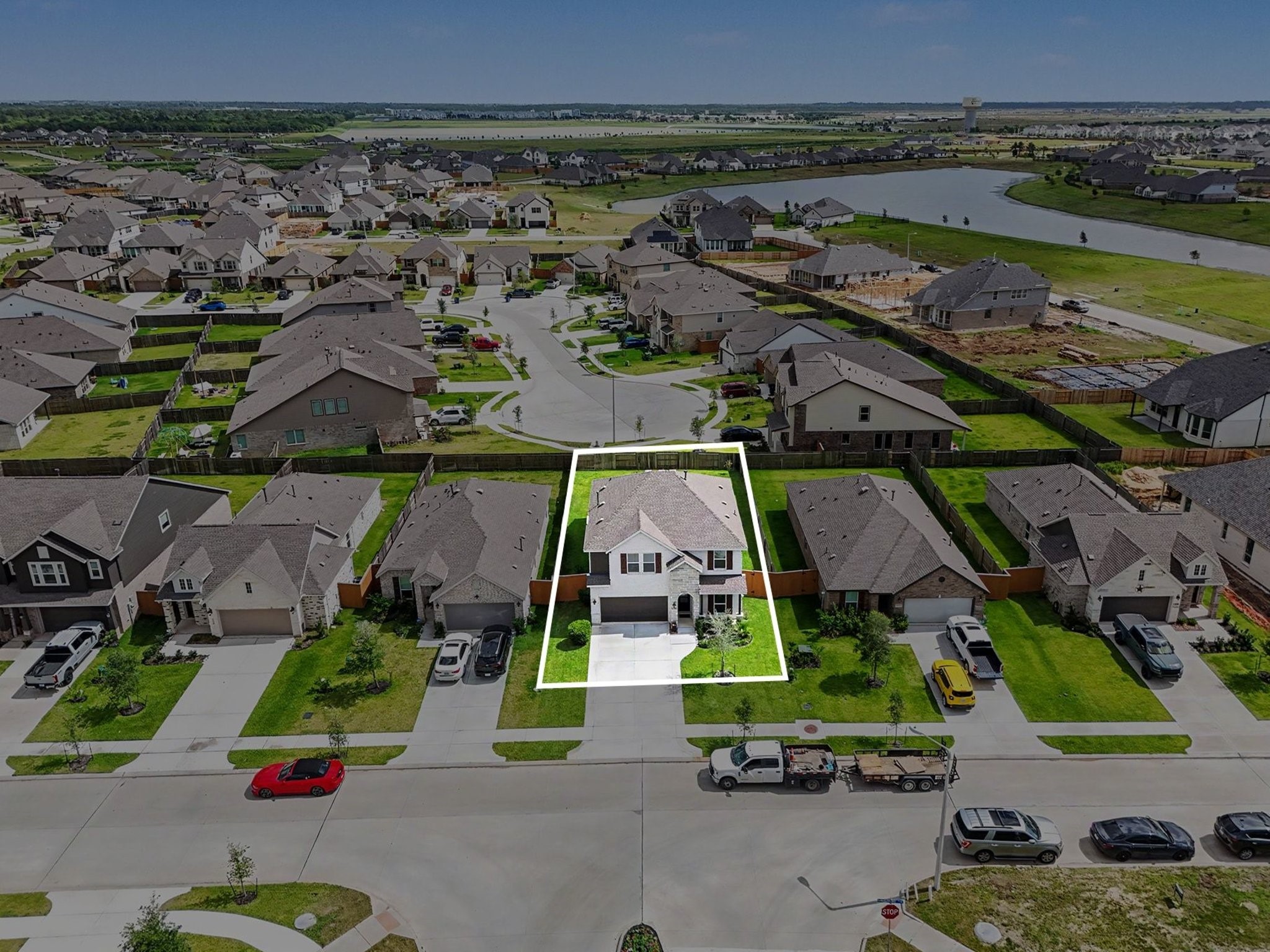 Lot line overlay clearly outlining the property boundaries and generous backyard space.