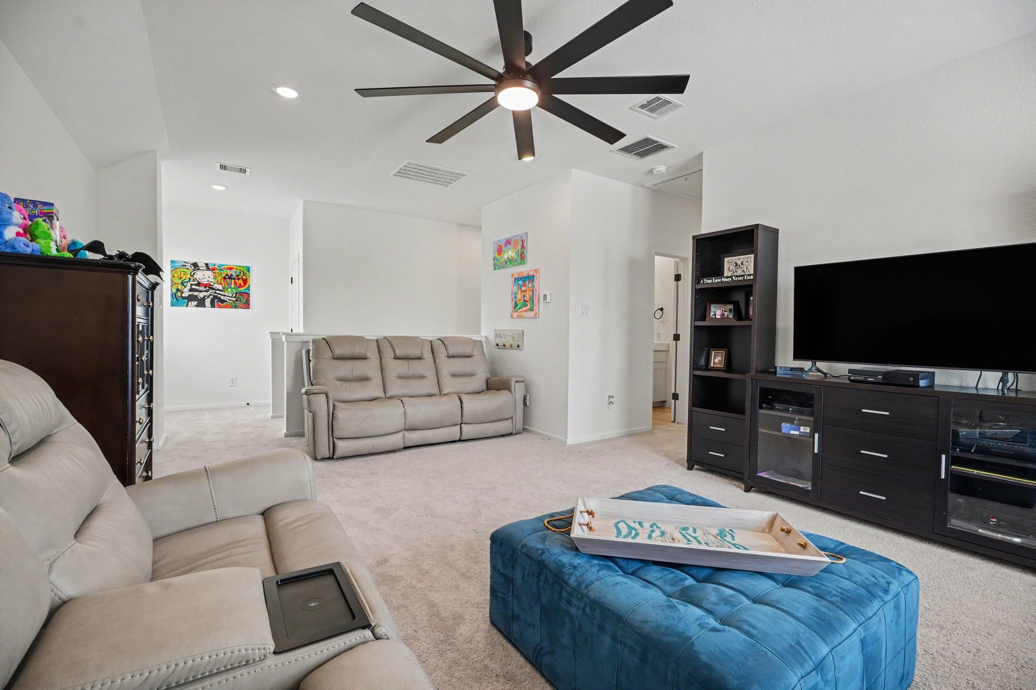Expansive game room providing a versatile space for media, recreation, hobbies, or a secondary living area.