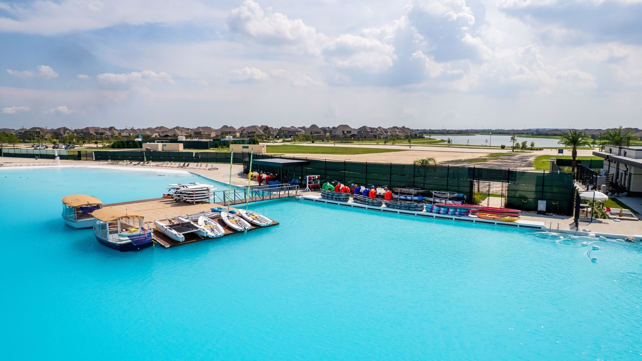 The community lagoon offers opportunities for kayaking, paddleboarding, and enjoying the waterfront lifestyle.