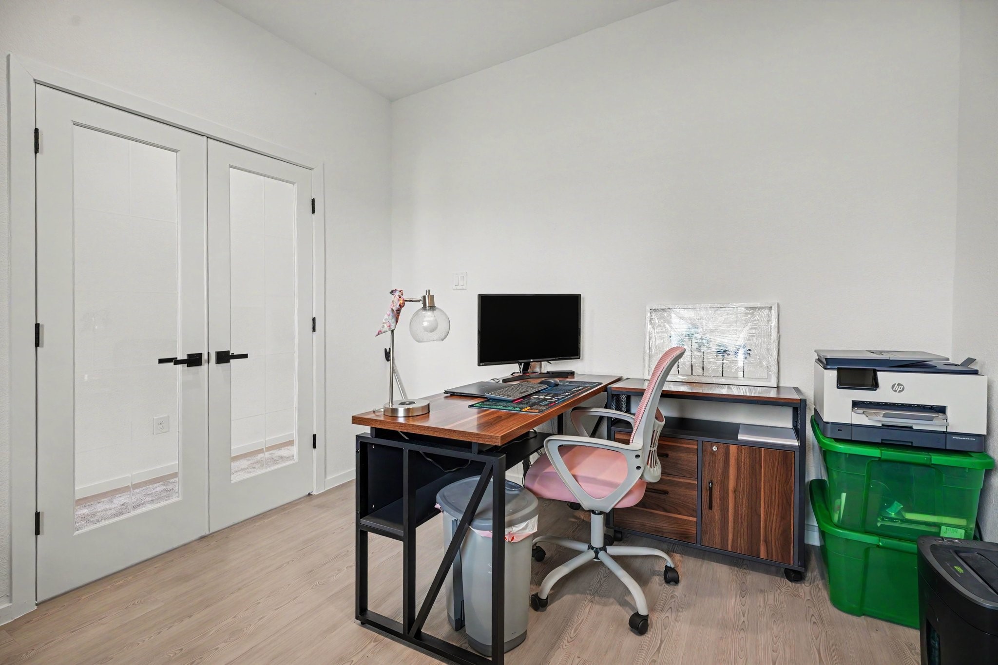 Versatile study located just off the entry, offering a quiet workspace with attractive glass French doors.