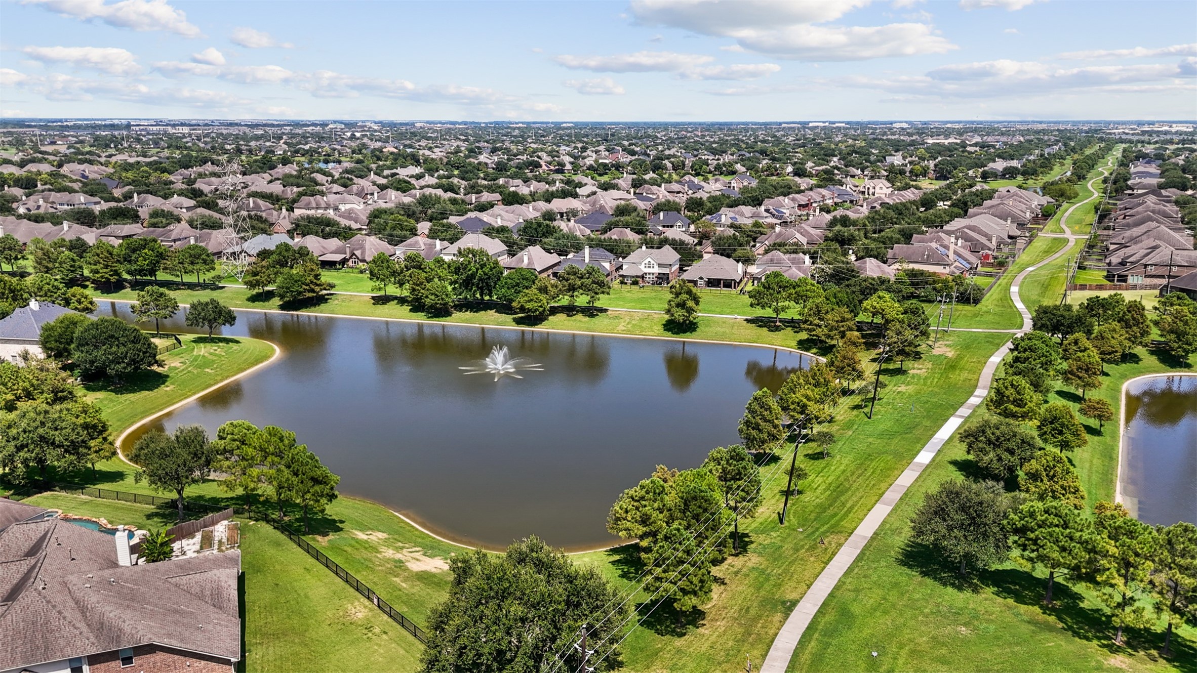 Exceptional location backing to green space and picturesque lakes, providing privacy with beautiful views.