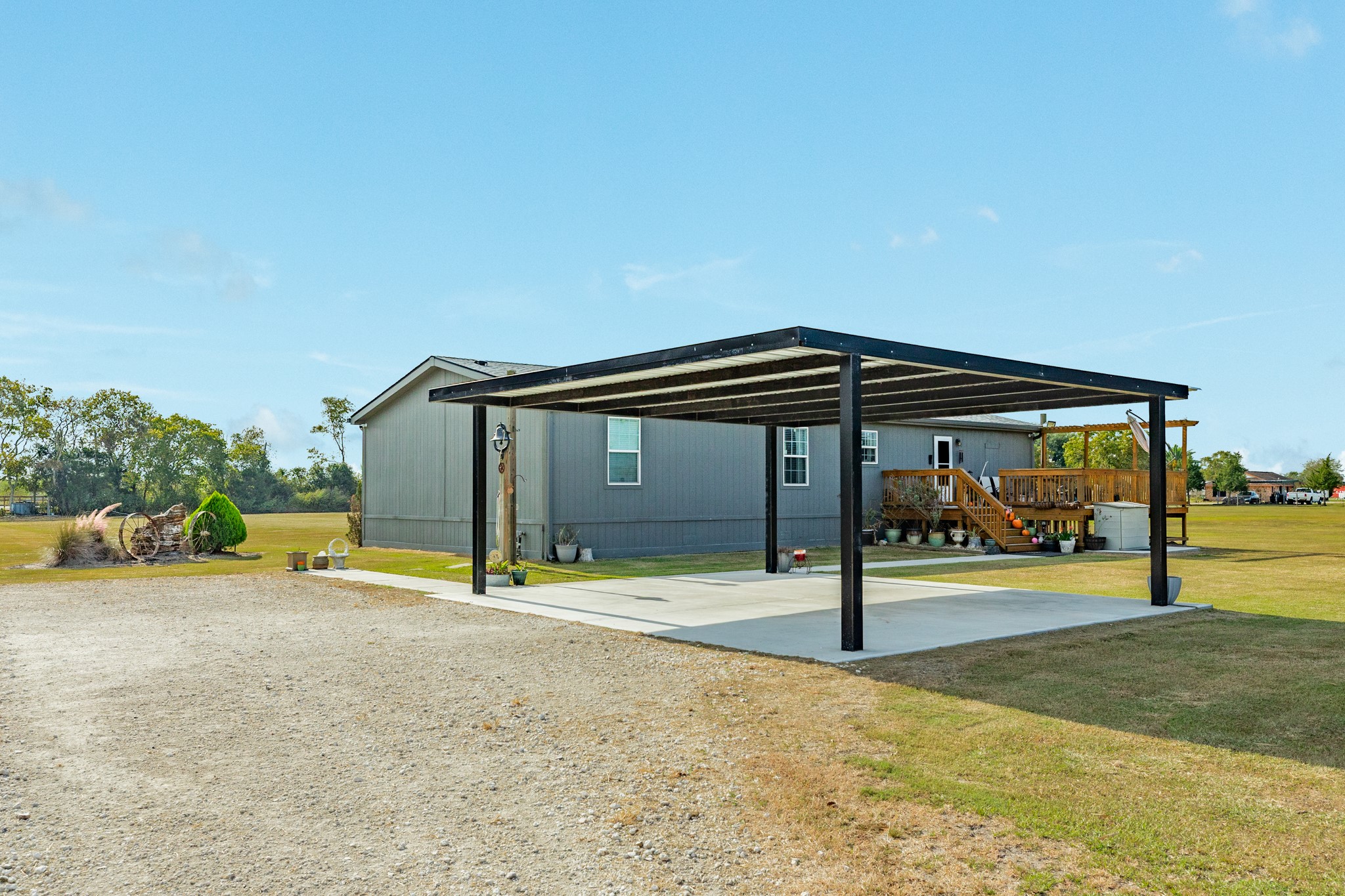 Covered carport with convenient access to the home.