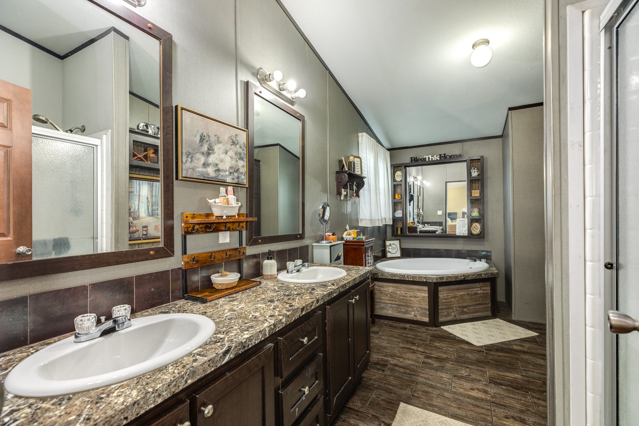 Double sinks, soaking tub, and separate shower.