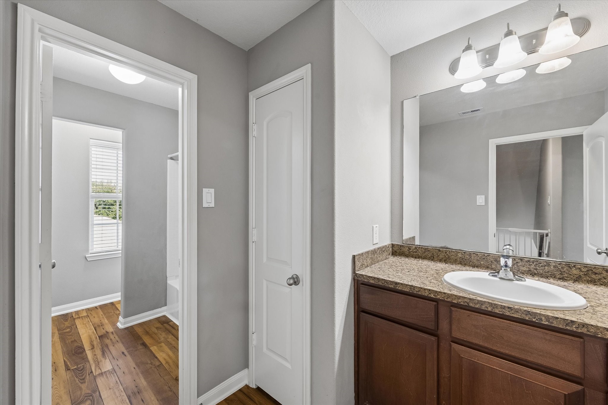 Second Bathroom - tub and toilet rooms are separate/private through those doorways.