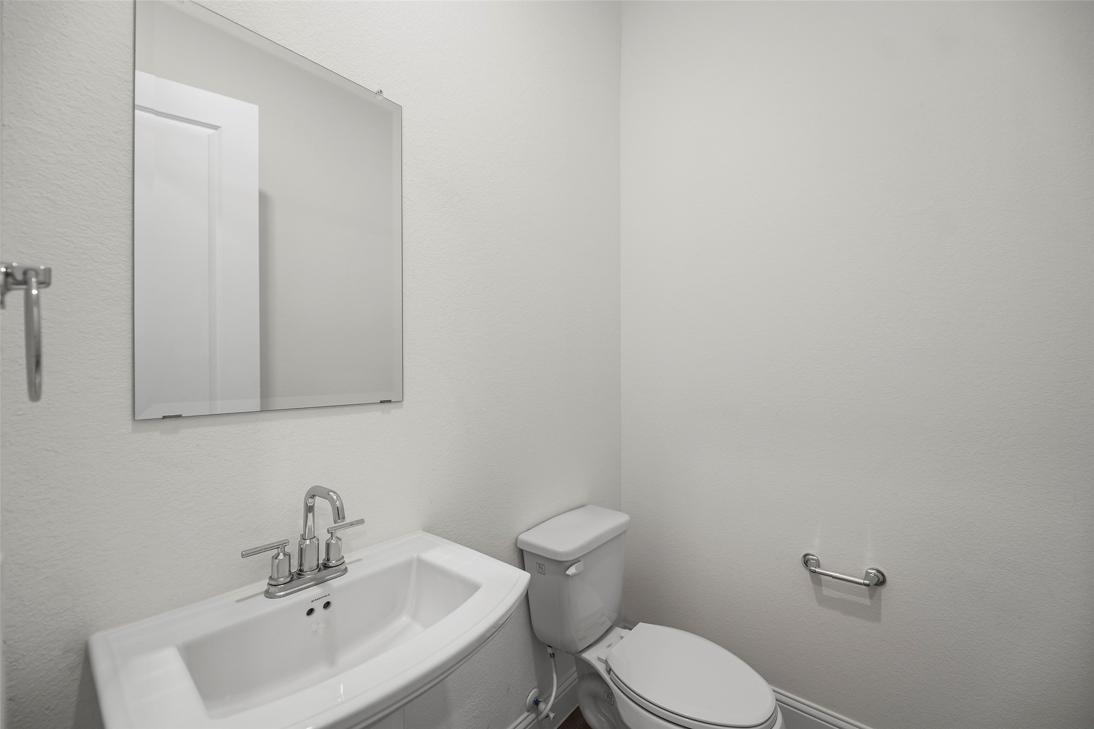 The Downstairs half bath
