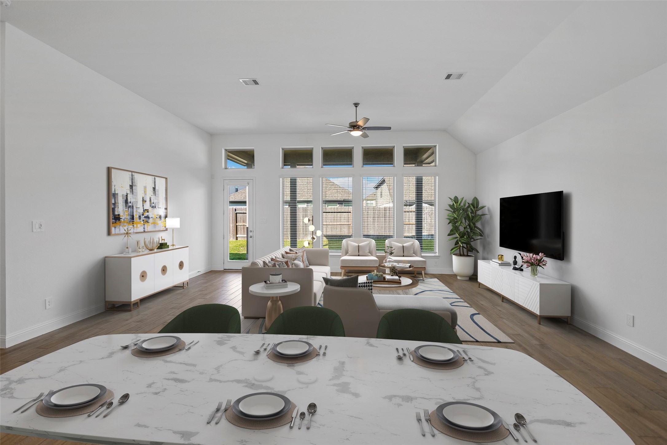 The same view of the dining and family room Virtually Staged
