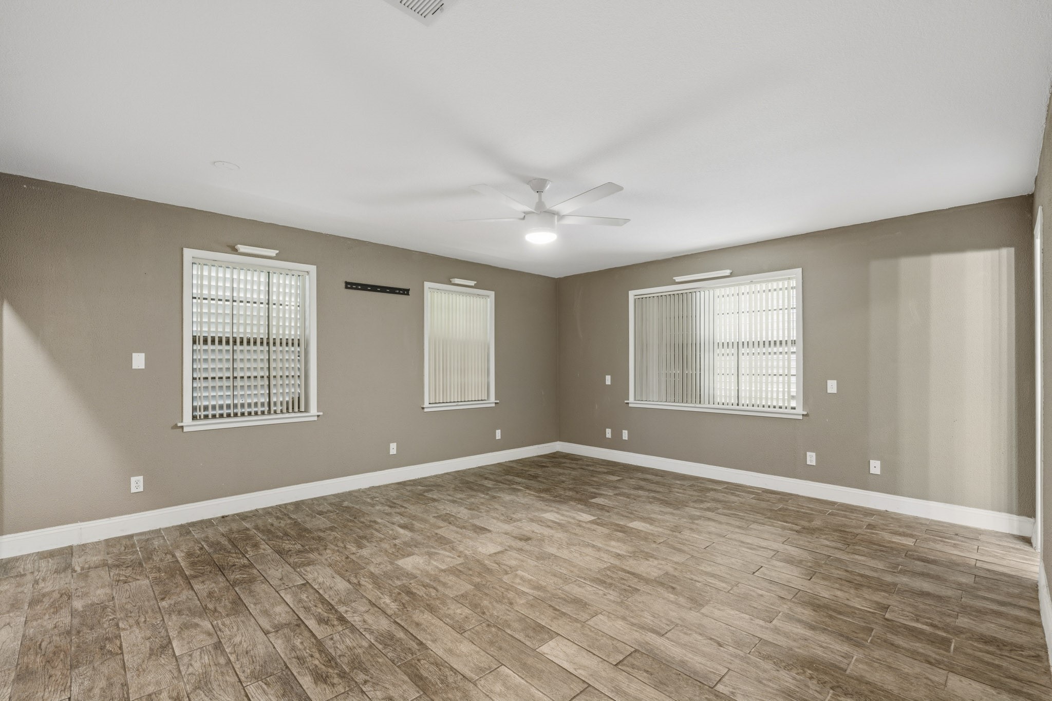 View 2 of the primary bedroom.
