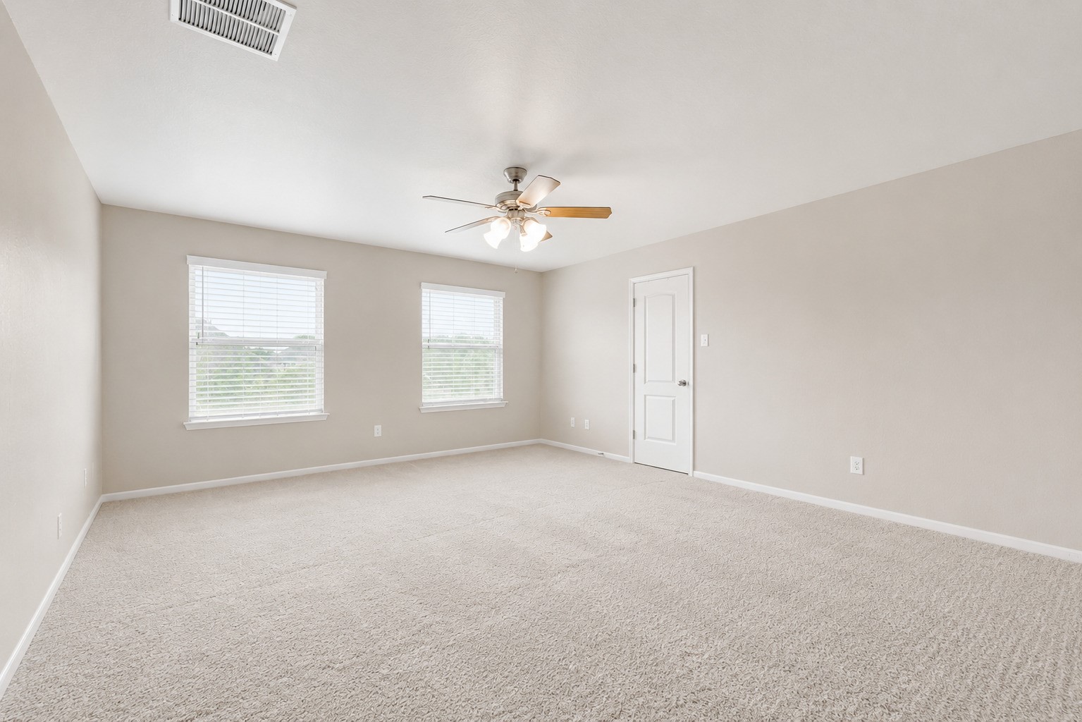 Bedroom 2 - Bright and spacious upstairs bedroom with vibrant colors and plenty of natural light.