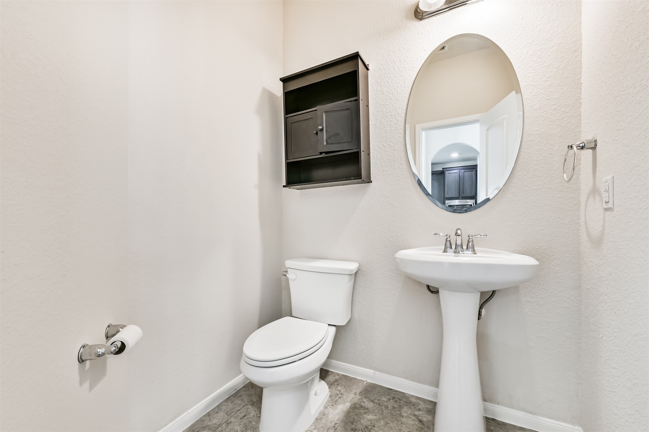Convenient first-floor half bath for guests.