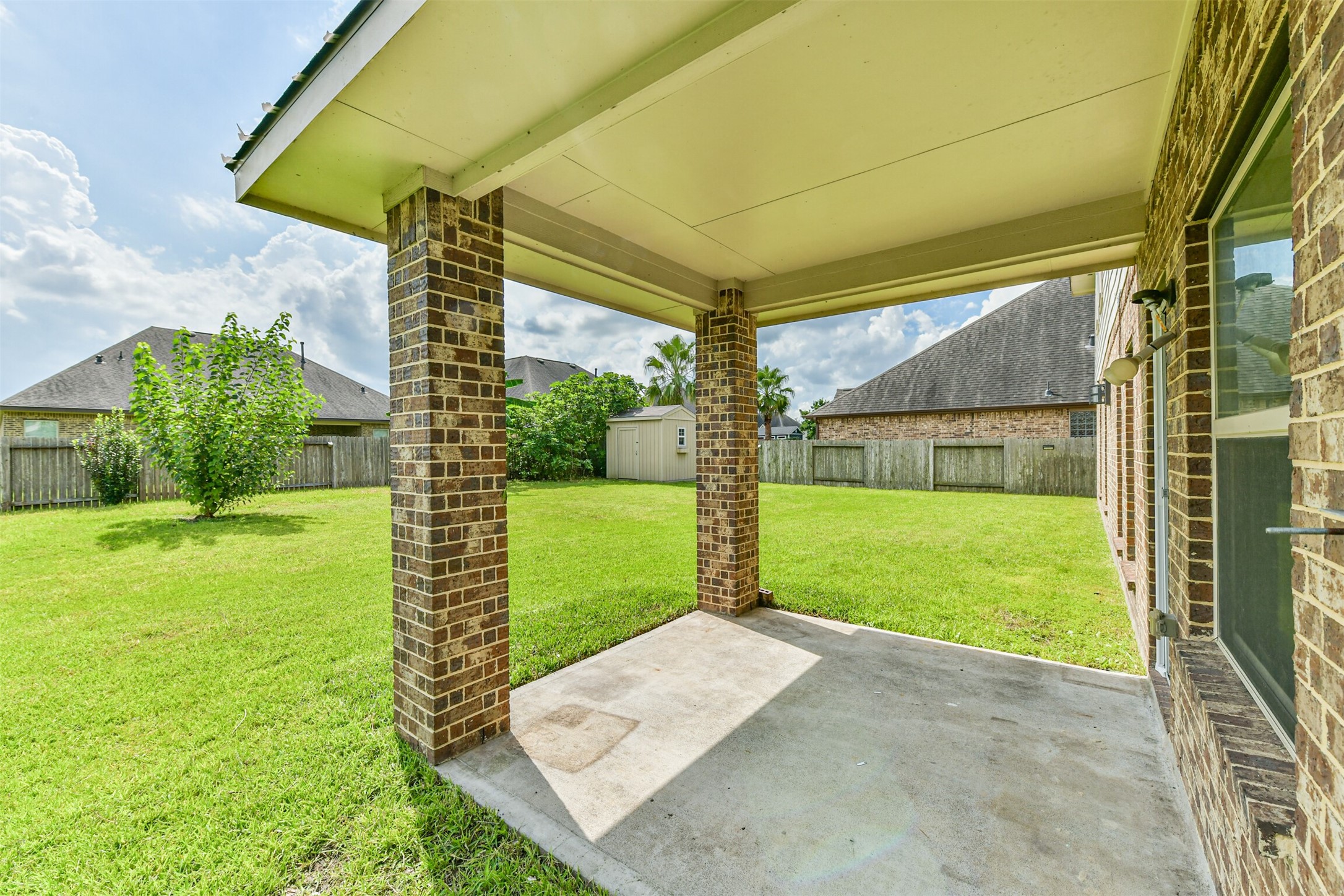 Charming covered patio perfect for relaxing and entertaining.
