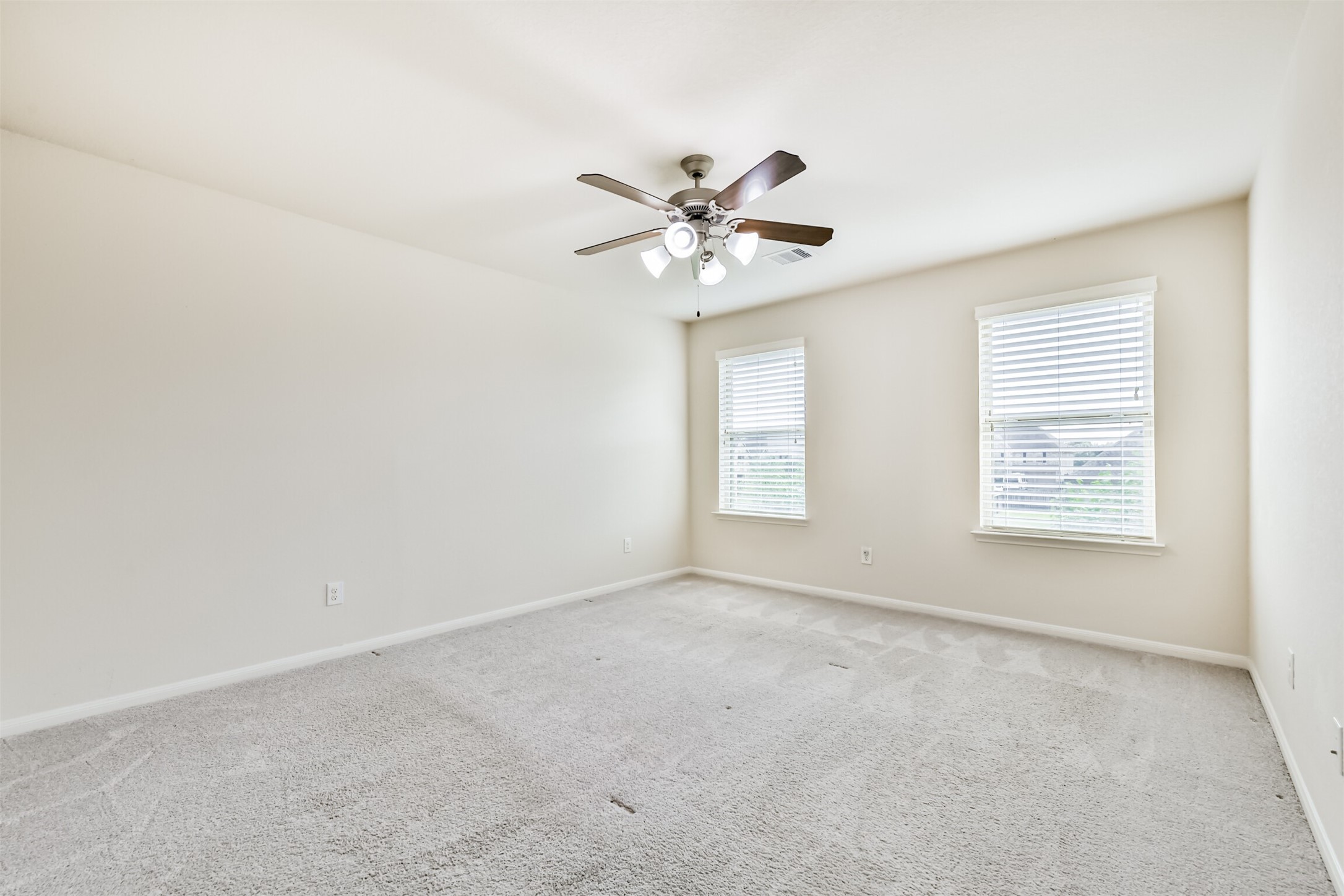 Bedroom 5 - Bright and spacious upstairs bedroom with ample natural light.