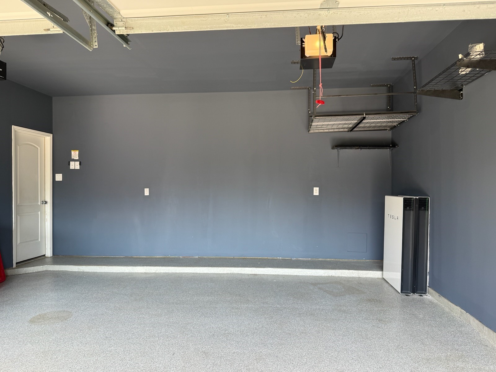 Pristine garage with durable epoxy flooring for a sleek finish.