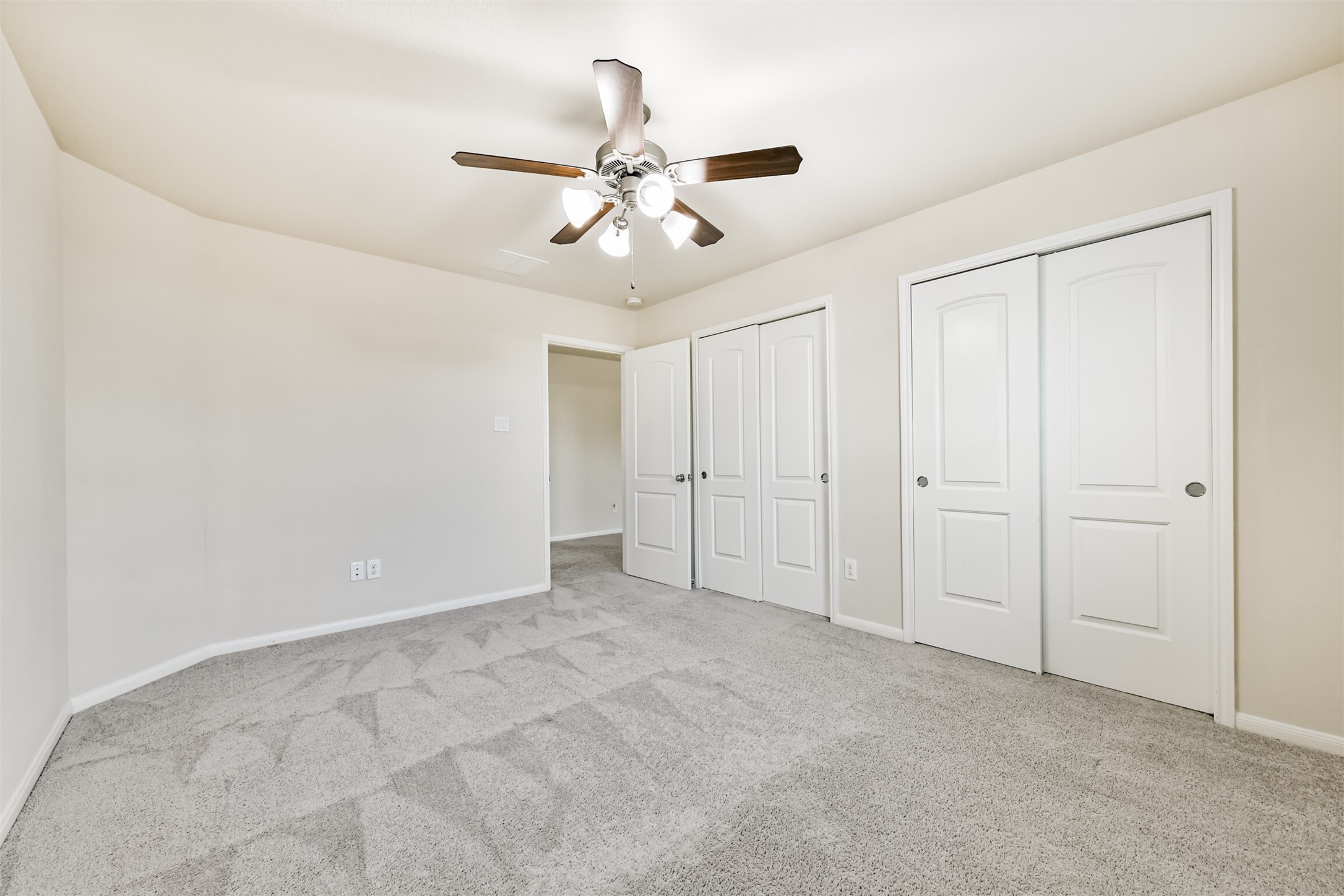 Bedroom 3 - Cozy upstairs bedroom with ample closet space and natural light.