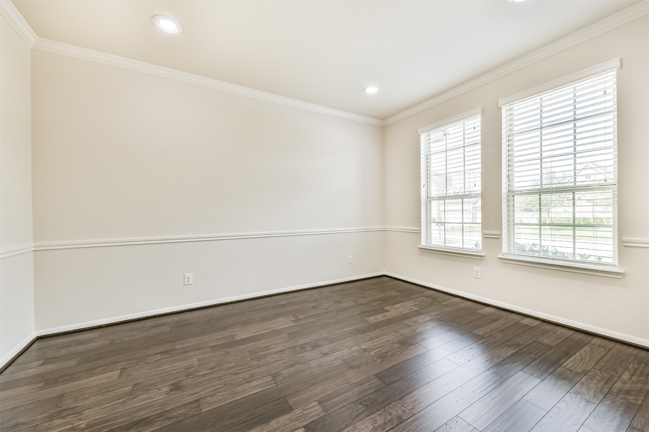 Elegant living space with abundant natural light, perfect for entertaining or relaxing.